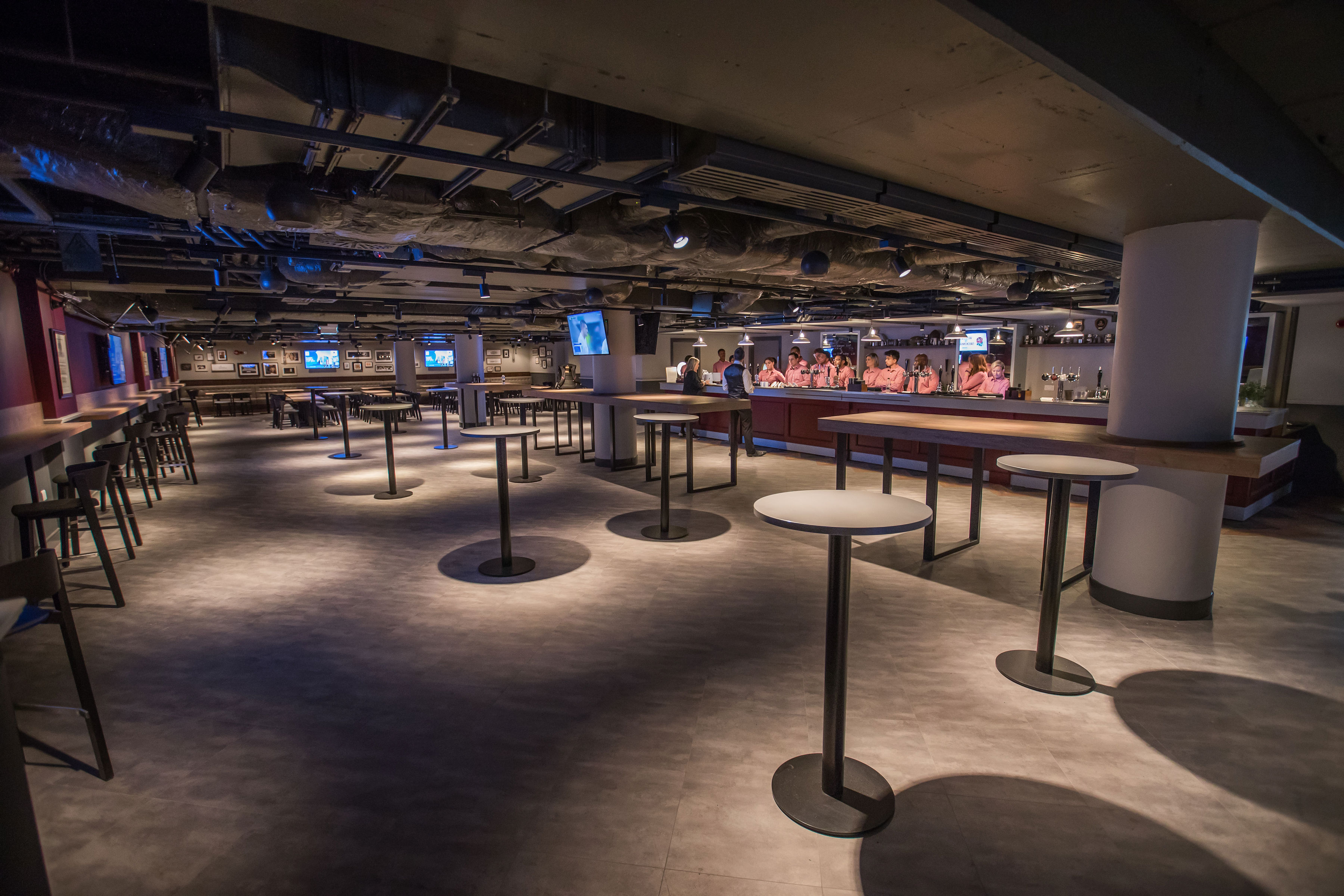 Union Ale House at Allianz Stadium - inviting event space with high-top tables for networking.