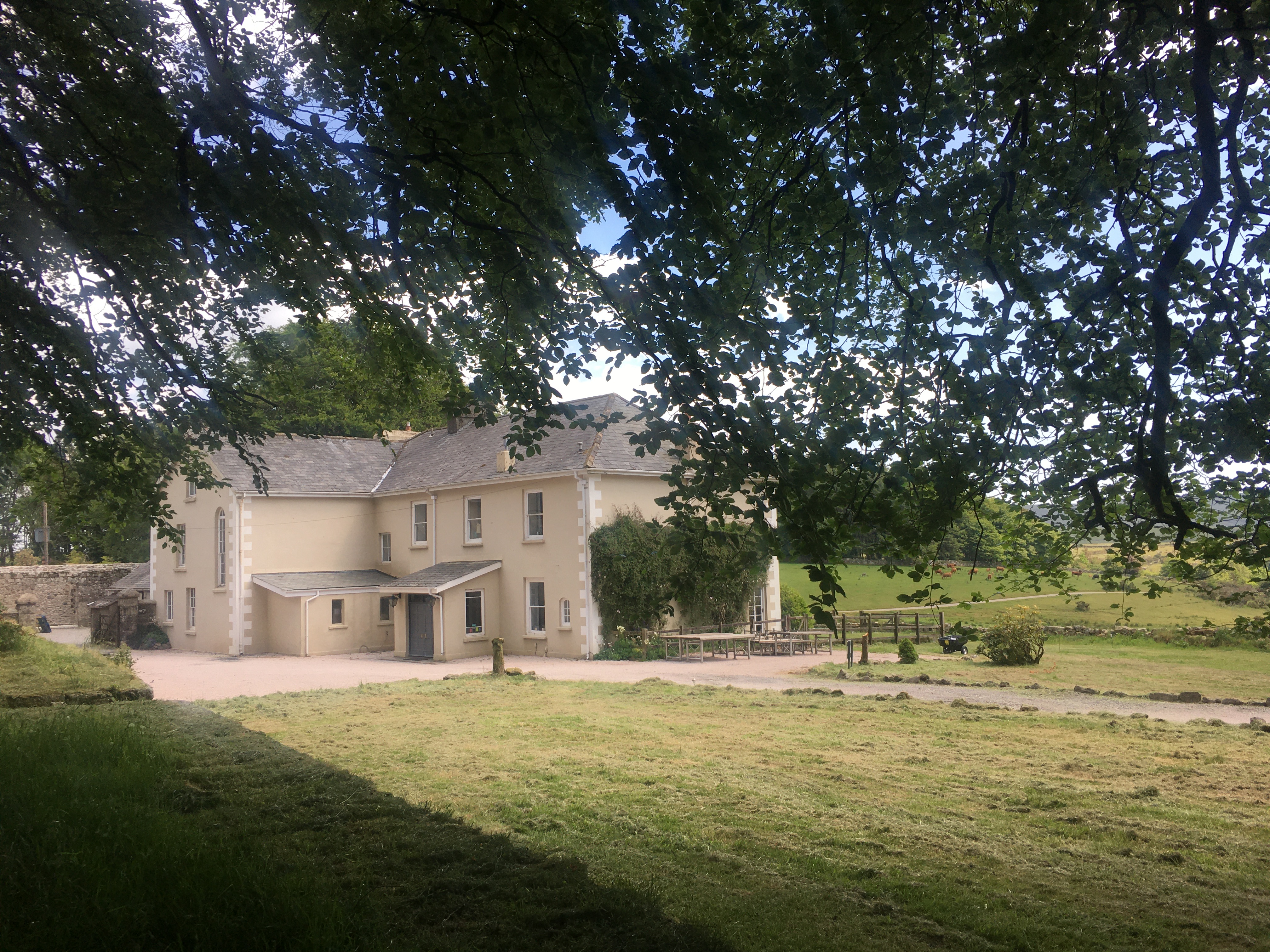 Prince Hall Country House: rustic venue for intimate meetings in serene landscape.