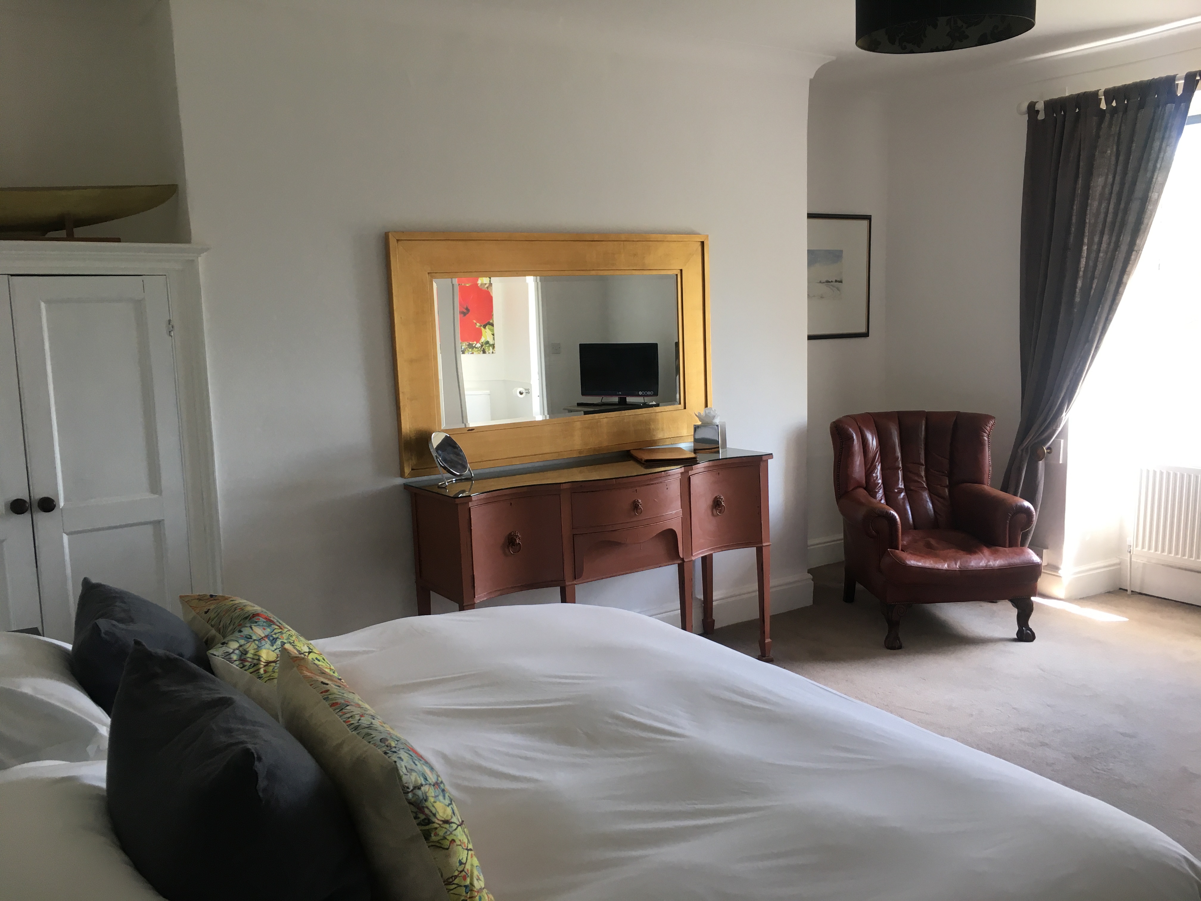 Cozy hotel room at Prince Hall Country House for meetings and retreats.