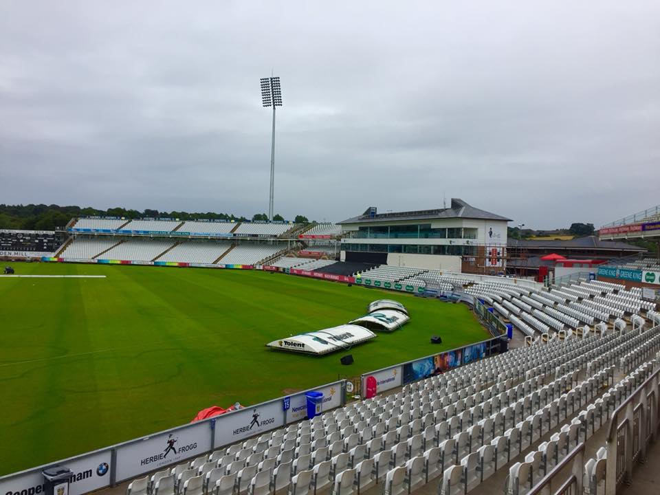 Riverside Suite sports venue with green field and tiered seating for large events.