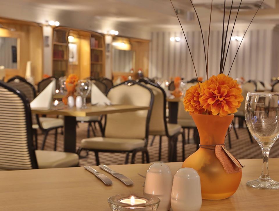 Elegant dining space in Poppy Suite, Best Western Bradford for events and gatherings.
