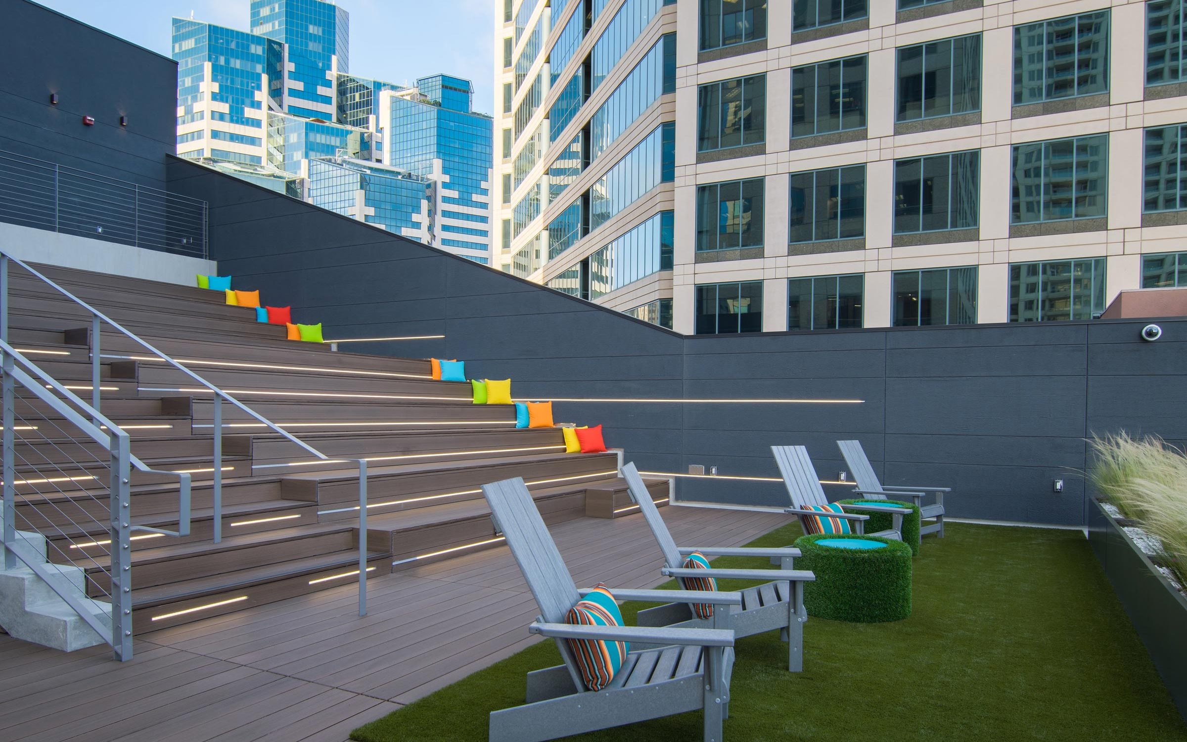 Outdoor event space with tiered seating, ideal for networking and team-building activities.