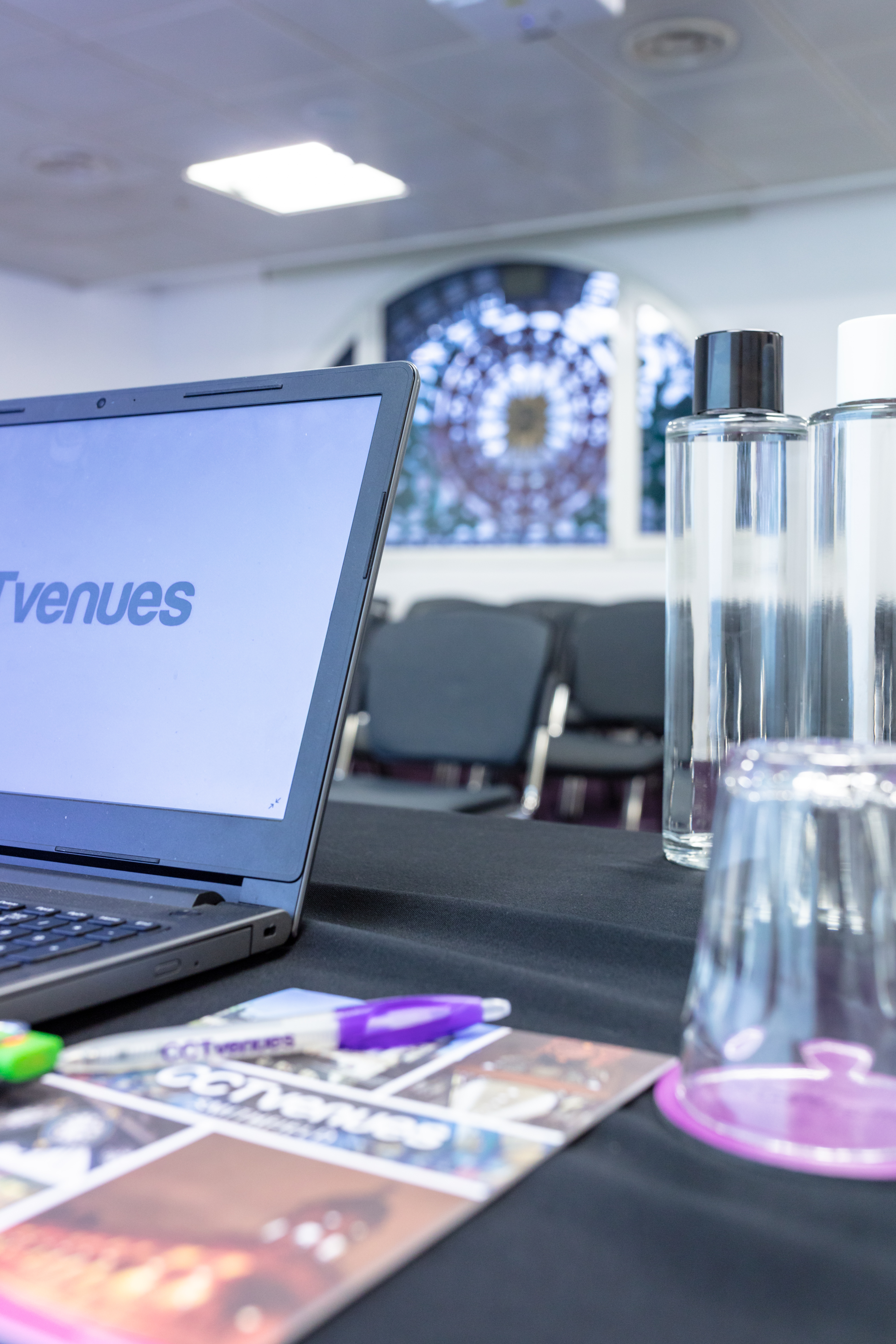 Covent Garden meeting space with laptop setup, ideal for corporate events and conferences.