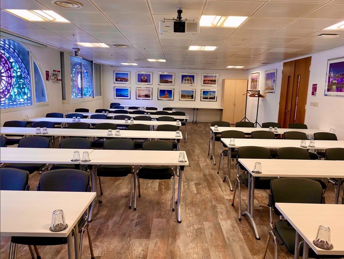 Billingsgate meeting room with stained glass, perfect for training workshops in London.