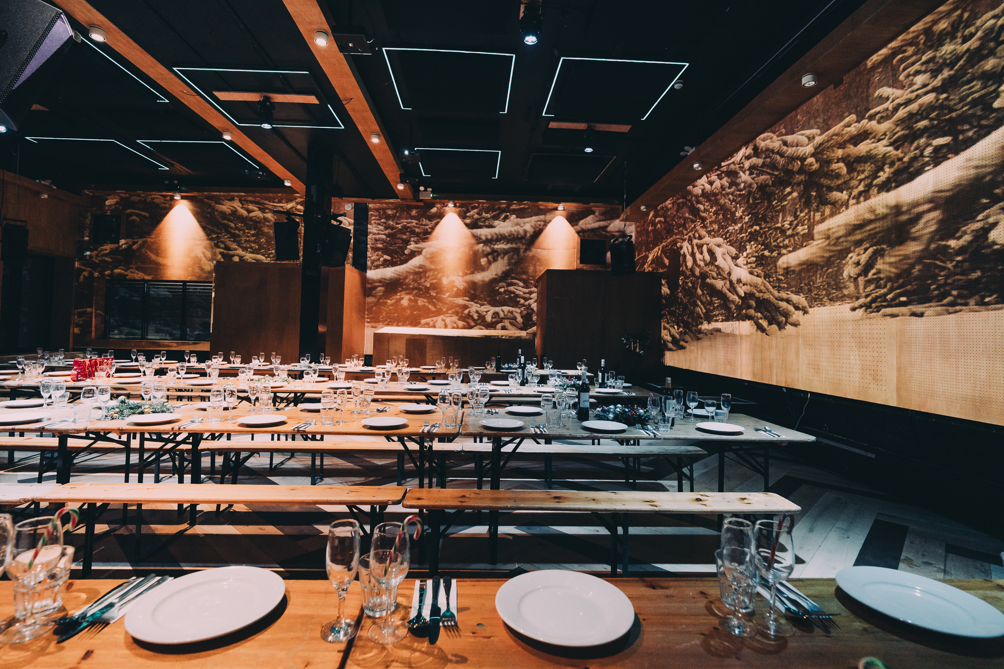 Christmas dining at No90 Hackney Wick, featuring rustic tables and elegant decor for events.