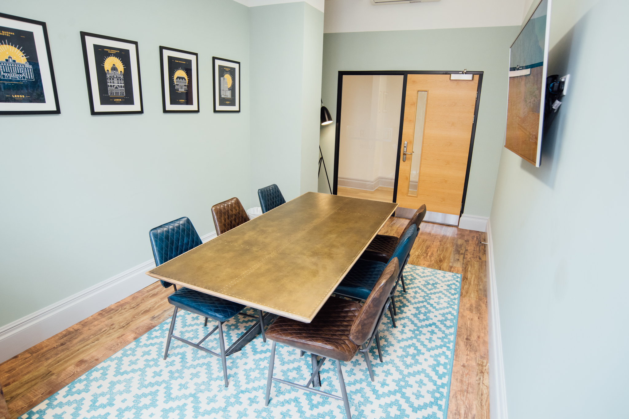 Kirkgate Suite meeting room with sleek table, ideal for brainstorming and presentations.