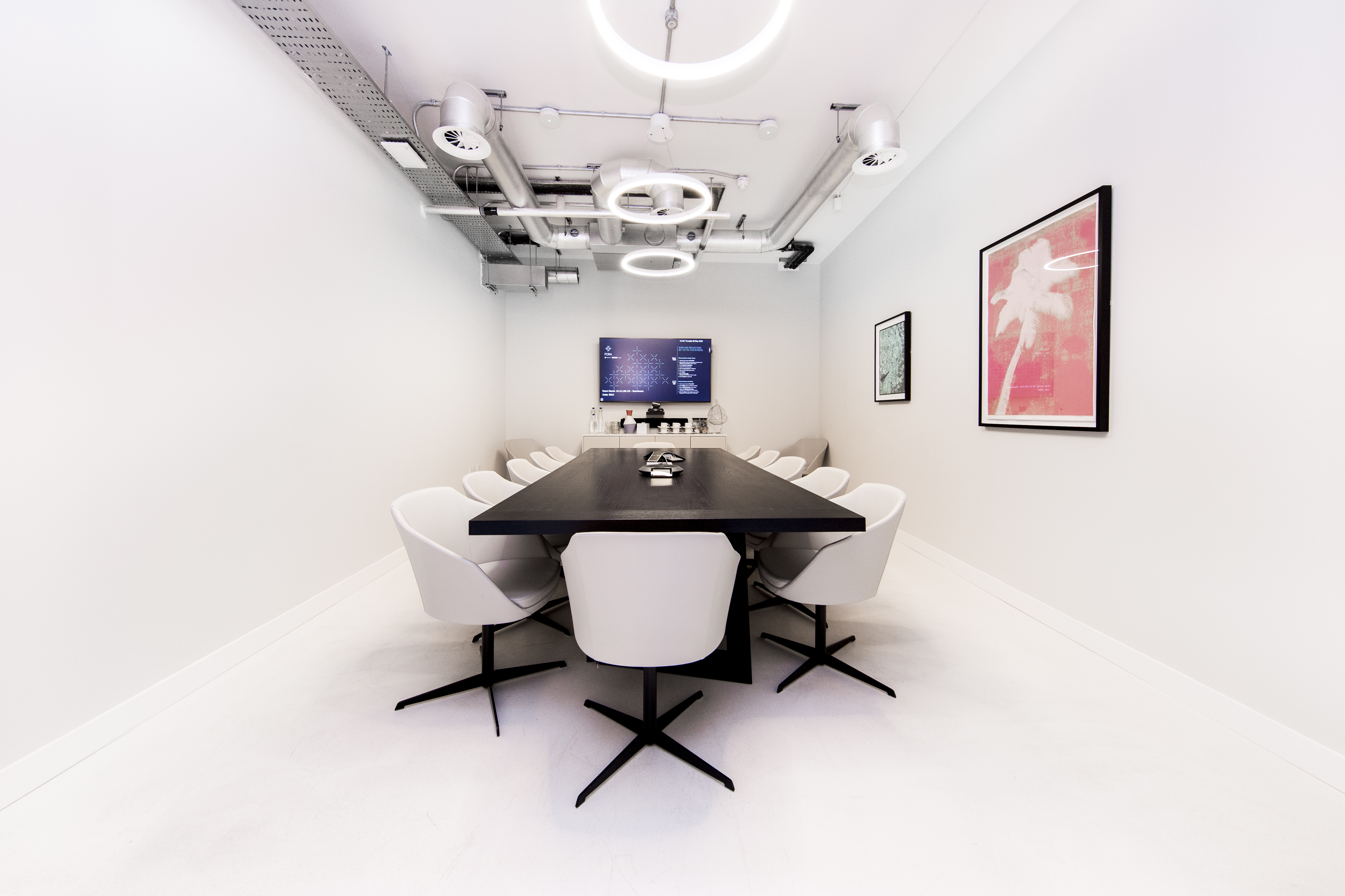 Minimalist boardroom in Fora Clerkenwell with ergonomic seating for strategy meetings.
