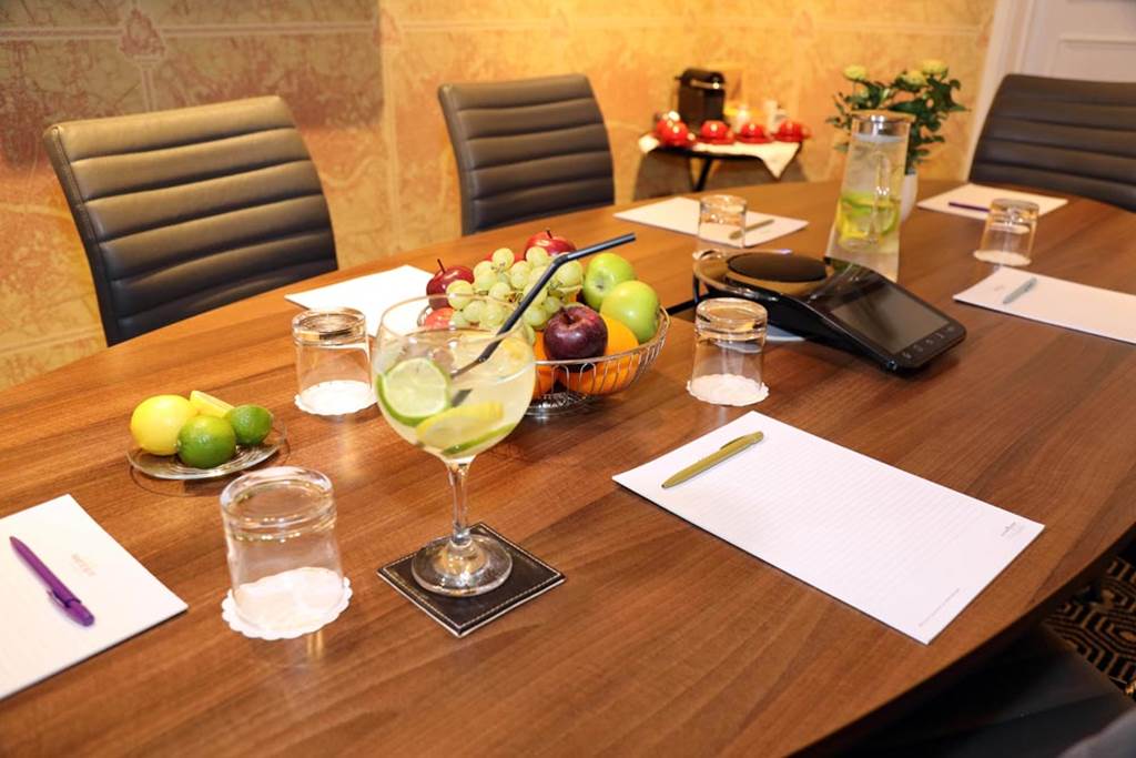 Meeting room at Mercure London Hyde Park Hotel with polished table, ideal for conferences.