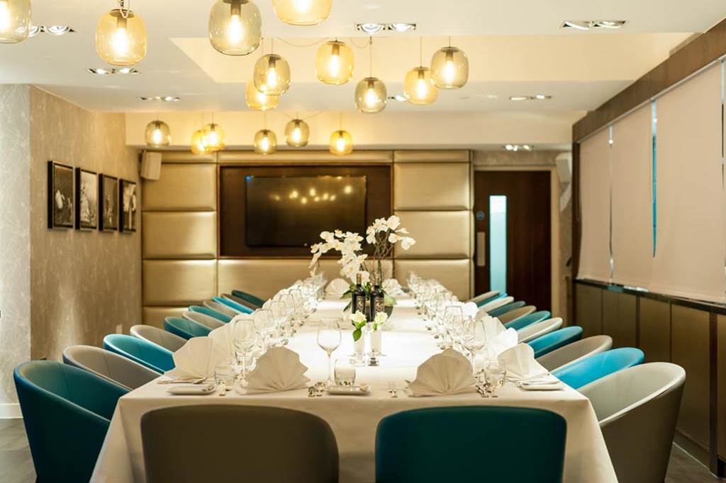 Elegant dining setup in The Serpentine Suite, ideal for corporate meetings and private events.