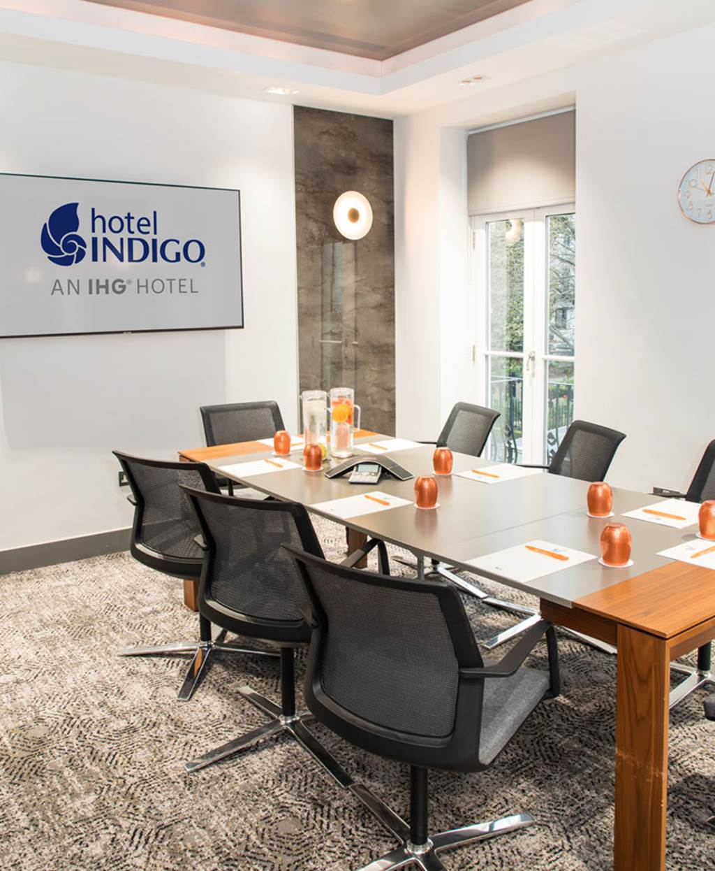 Modern meeting room in Hotel Indigo London with sleek conference table for productive sessions.