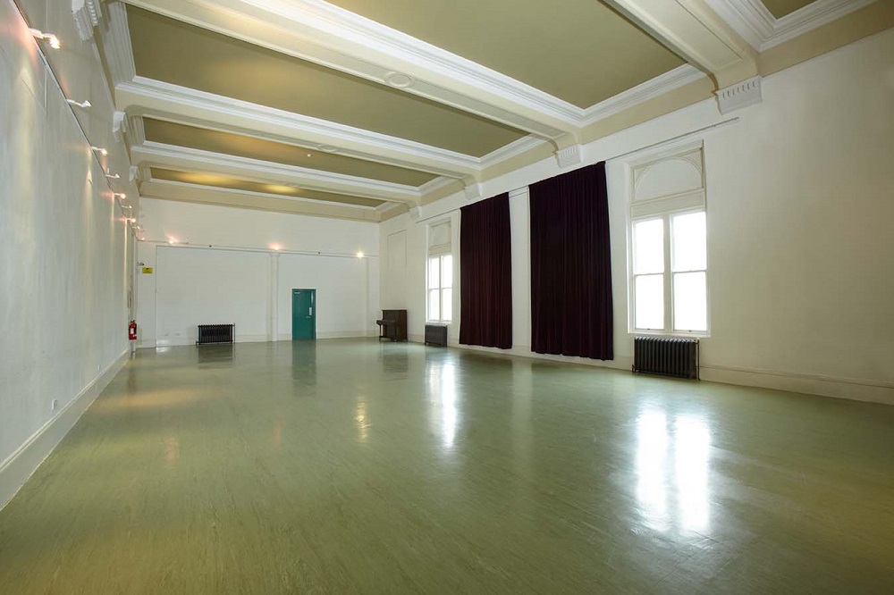 Indus Hall at Kala Sangam: spacious event room with high ceilings for workshops and receptions.