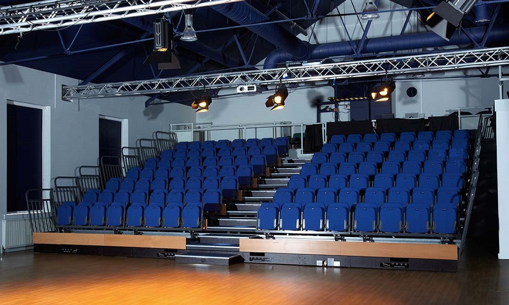 Ganges Theatre auditorium with tiered seating, ideal for presentations and performances.