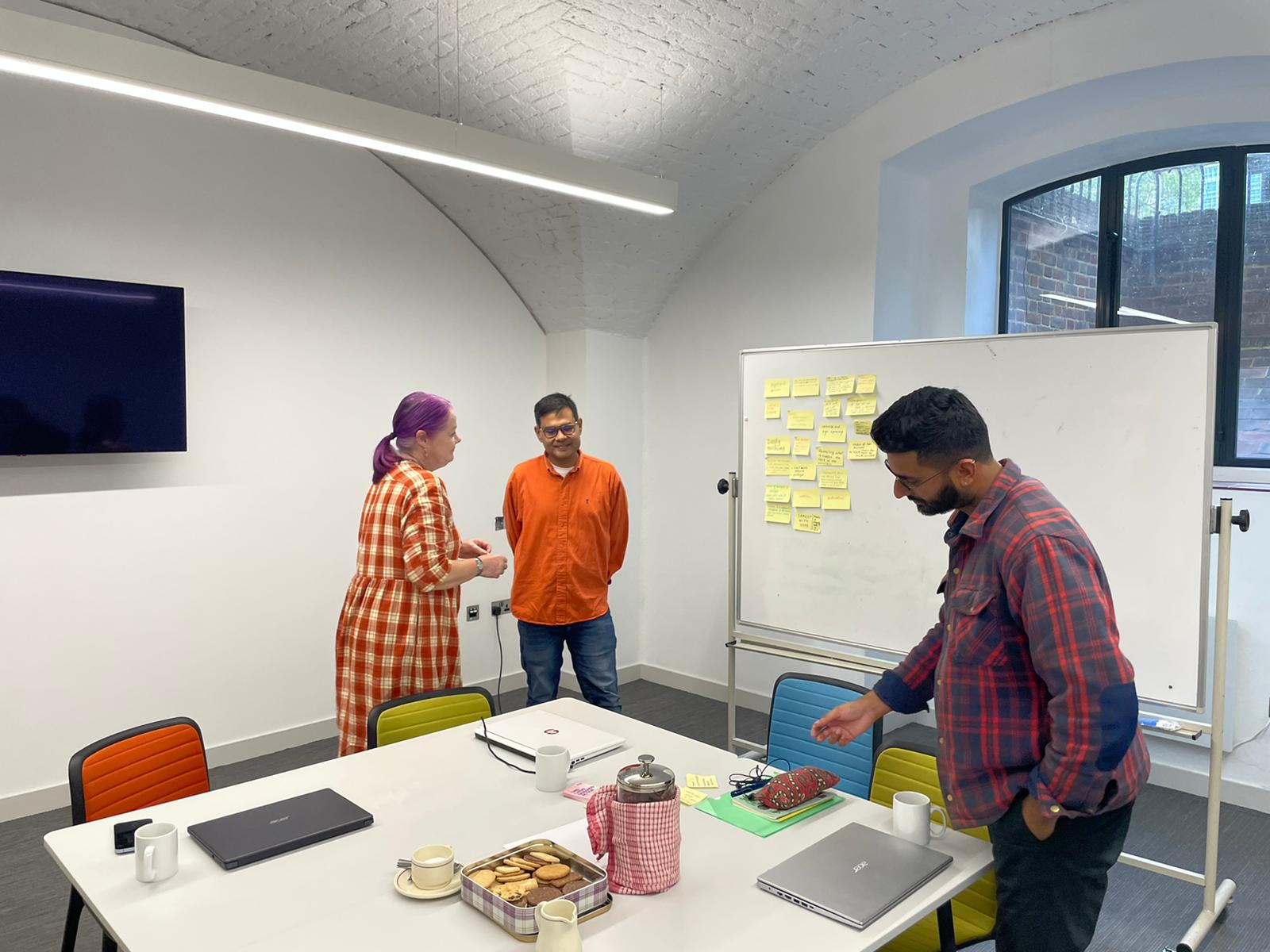 "Collaborative brainstorming in modern meeting room at St John's Church Waterloo"