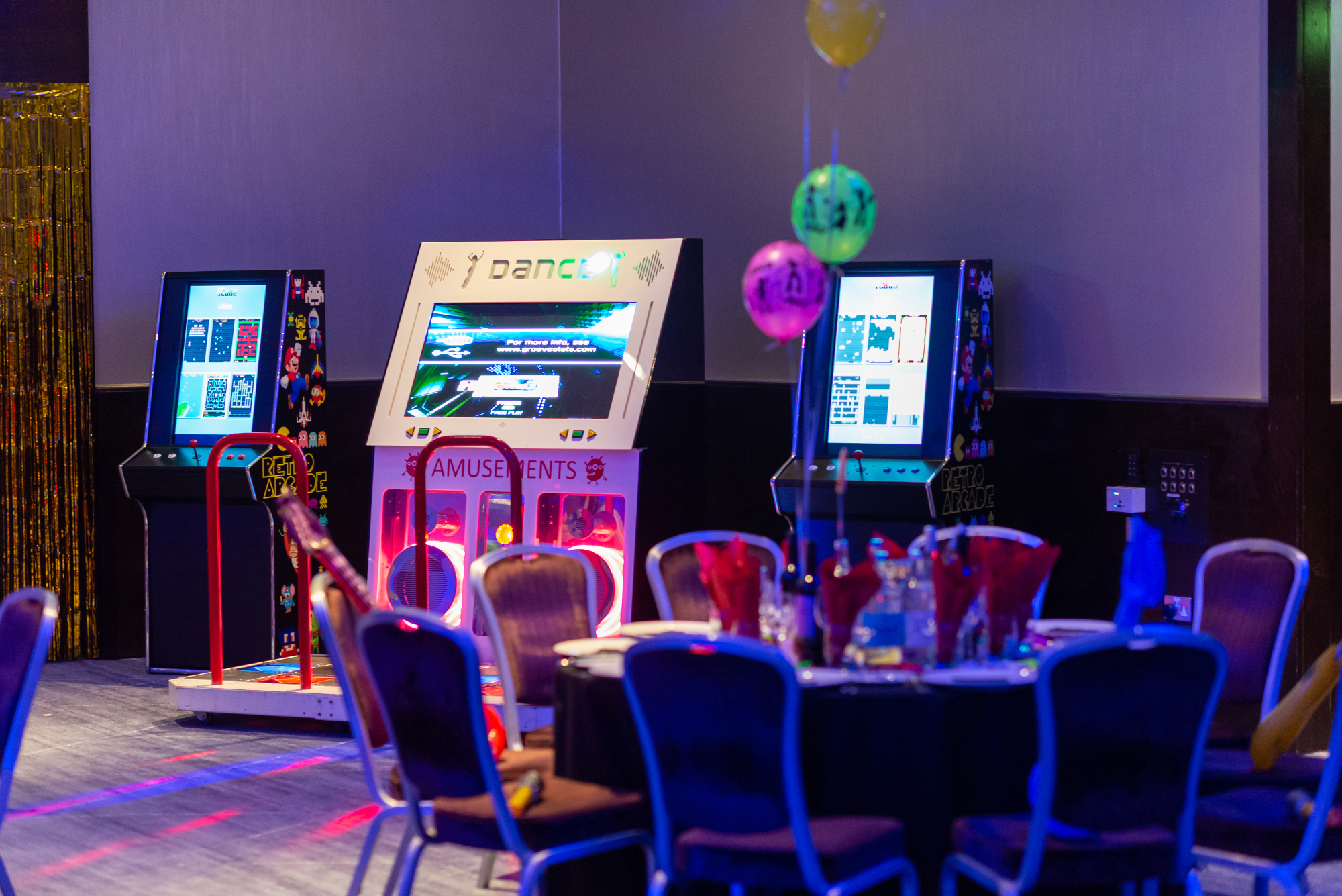 Vibrant event space at Hilton London Tower Bridge with interactive dance machines.