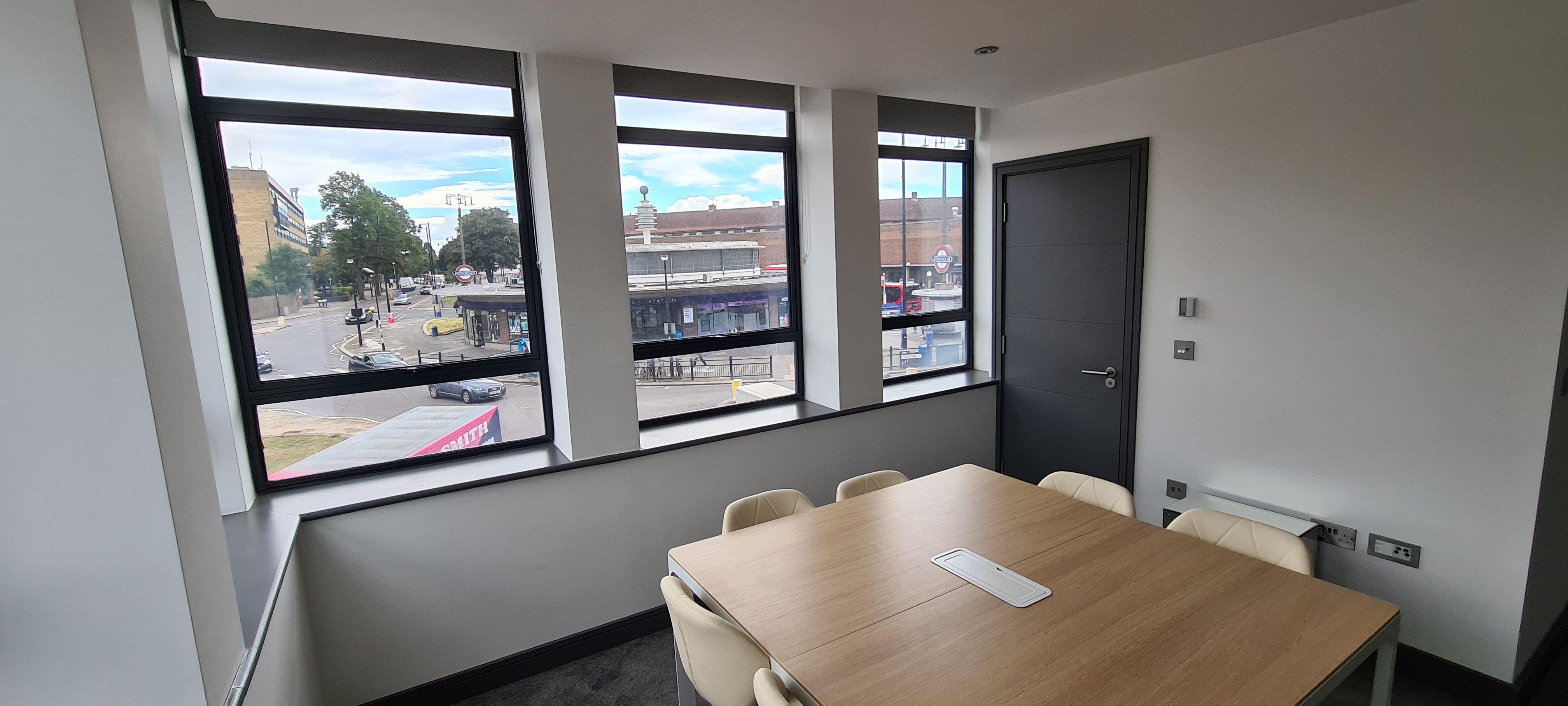 Modern Southpoint House meeting room with large windows for collaborative events.