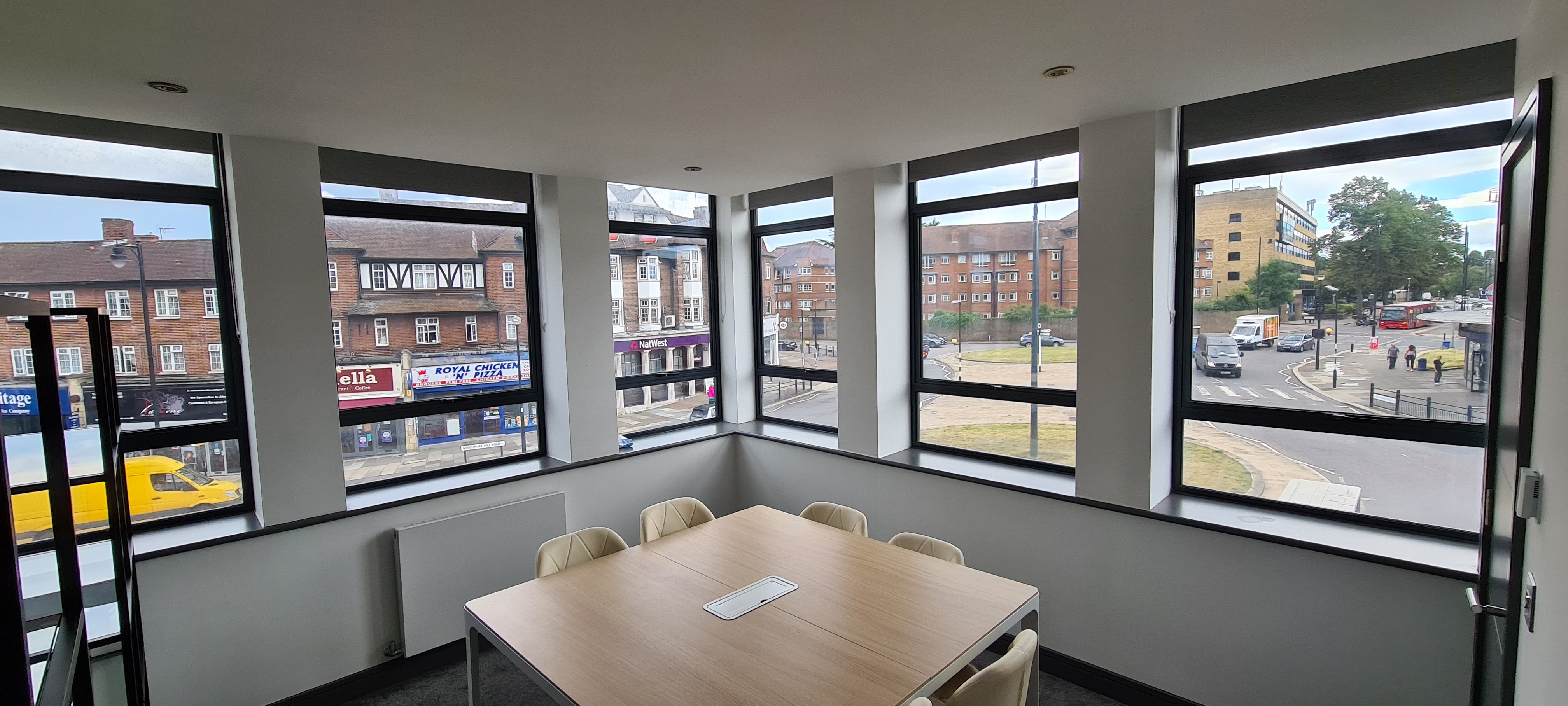 Modern Southpoint House meeting room with large windows for vibrant corporate events.