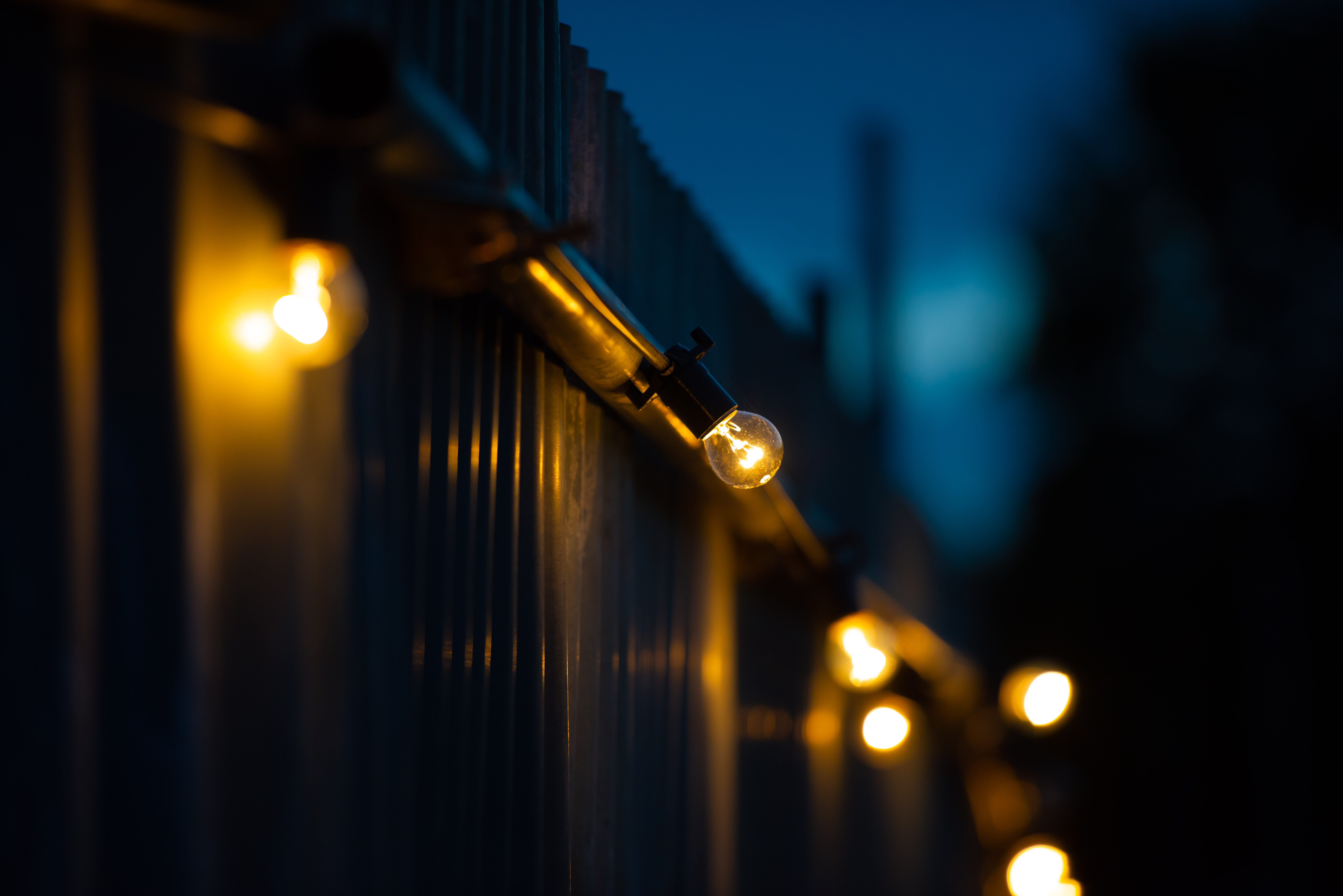 Warm glowing lights at Sunset Cinema, perfect for cozy weddings and outdoor parties.