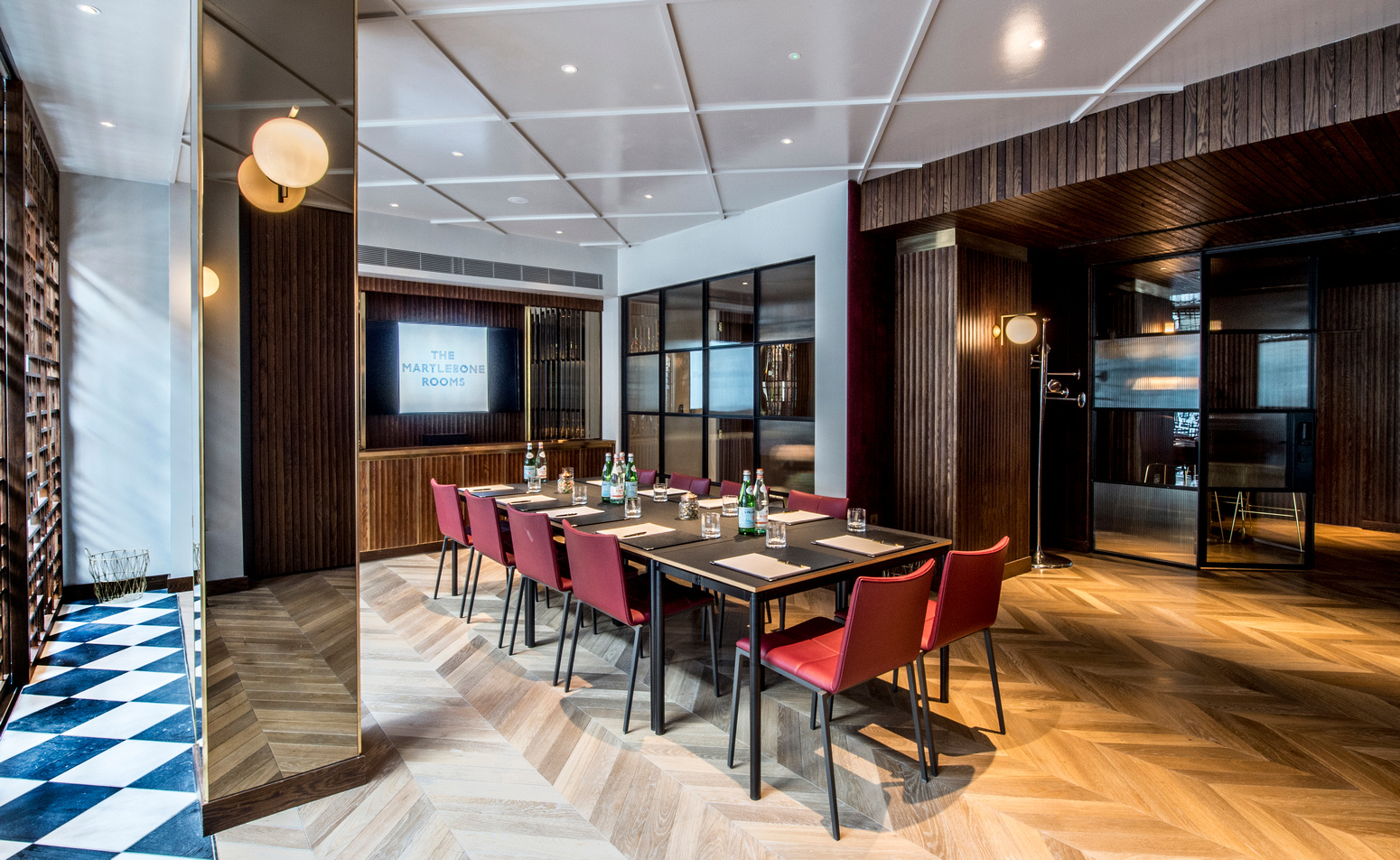 Modern meeting room at The Marylebone, ideal for corporate events and workshops.