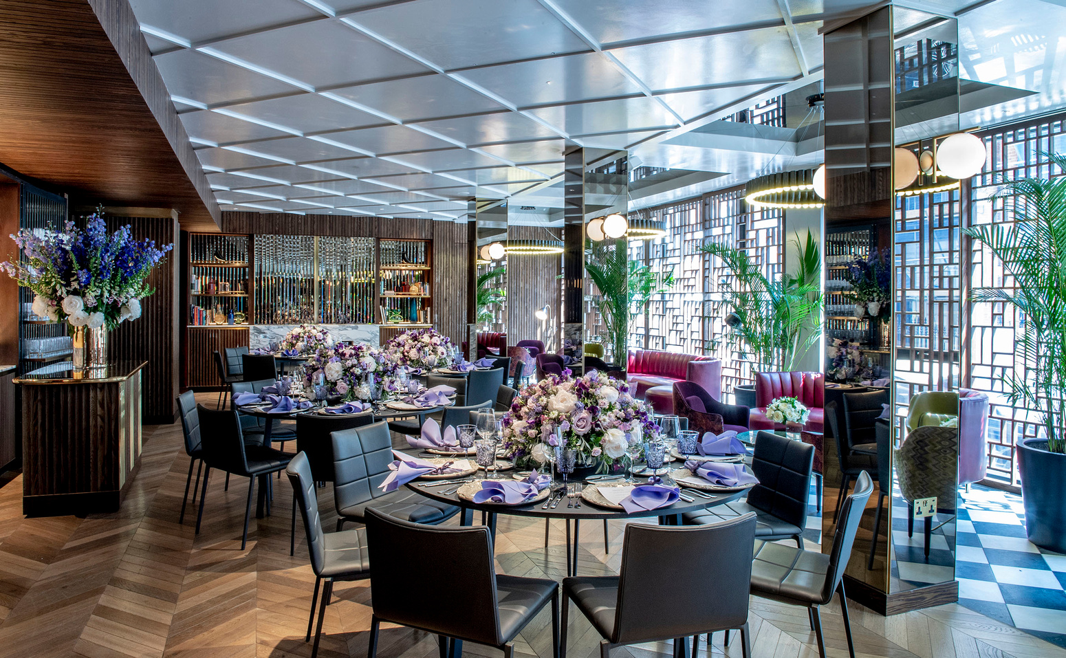 Elegant event space at Number Six, featuring floral arrangements for corporate meetings.