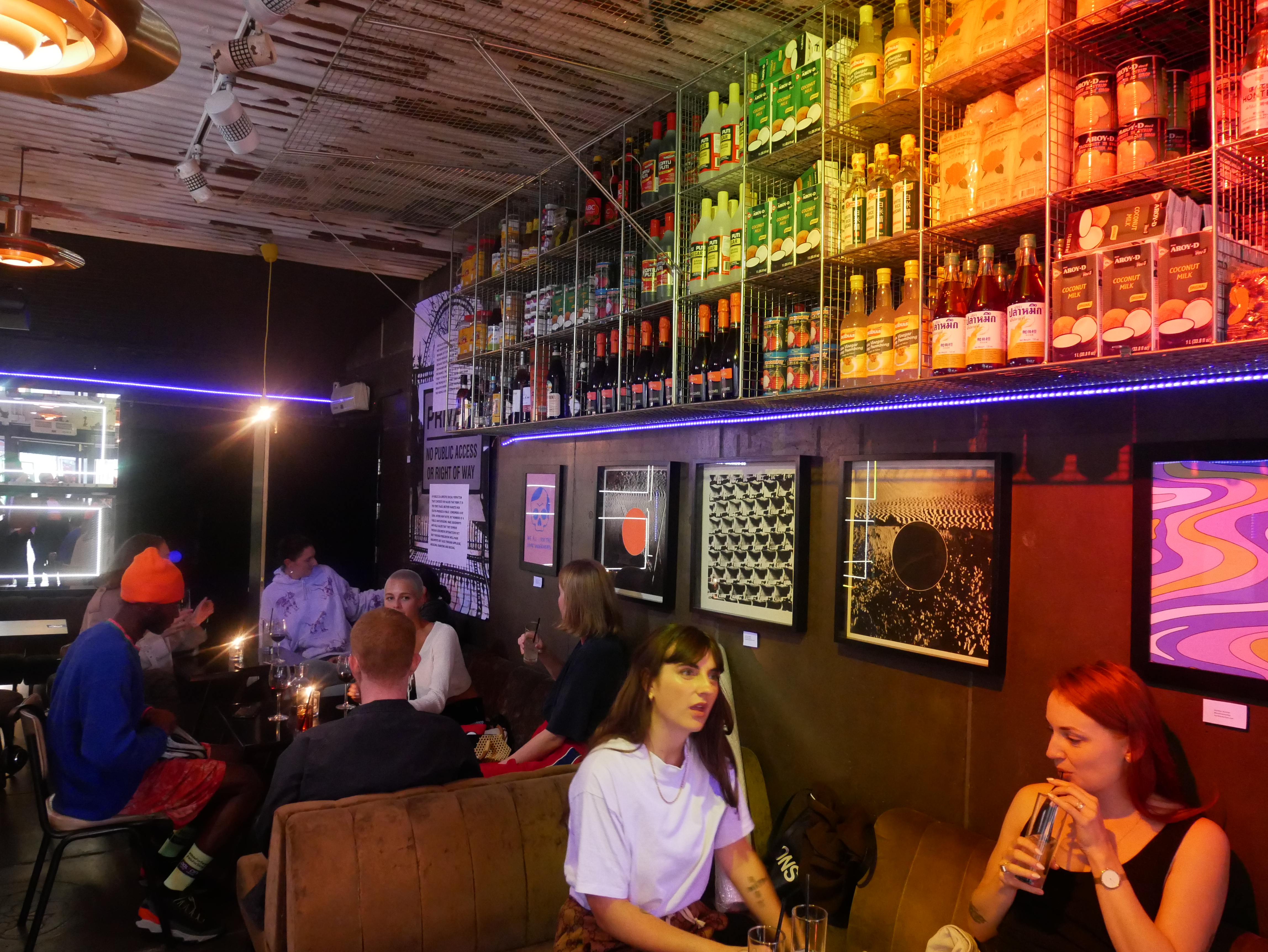 Vibrant venue in Sugarlandia for networking events with eclectic decor and bar setup.