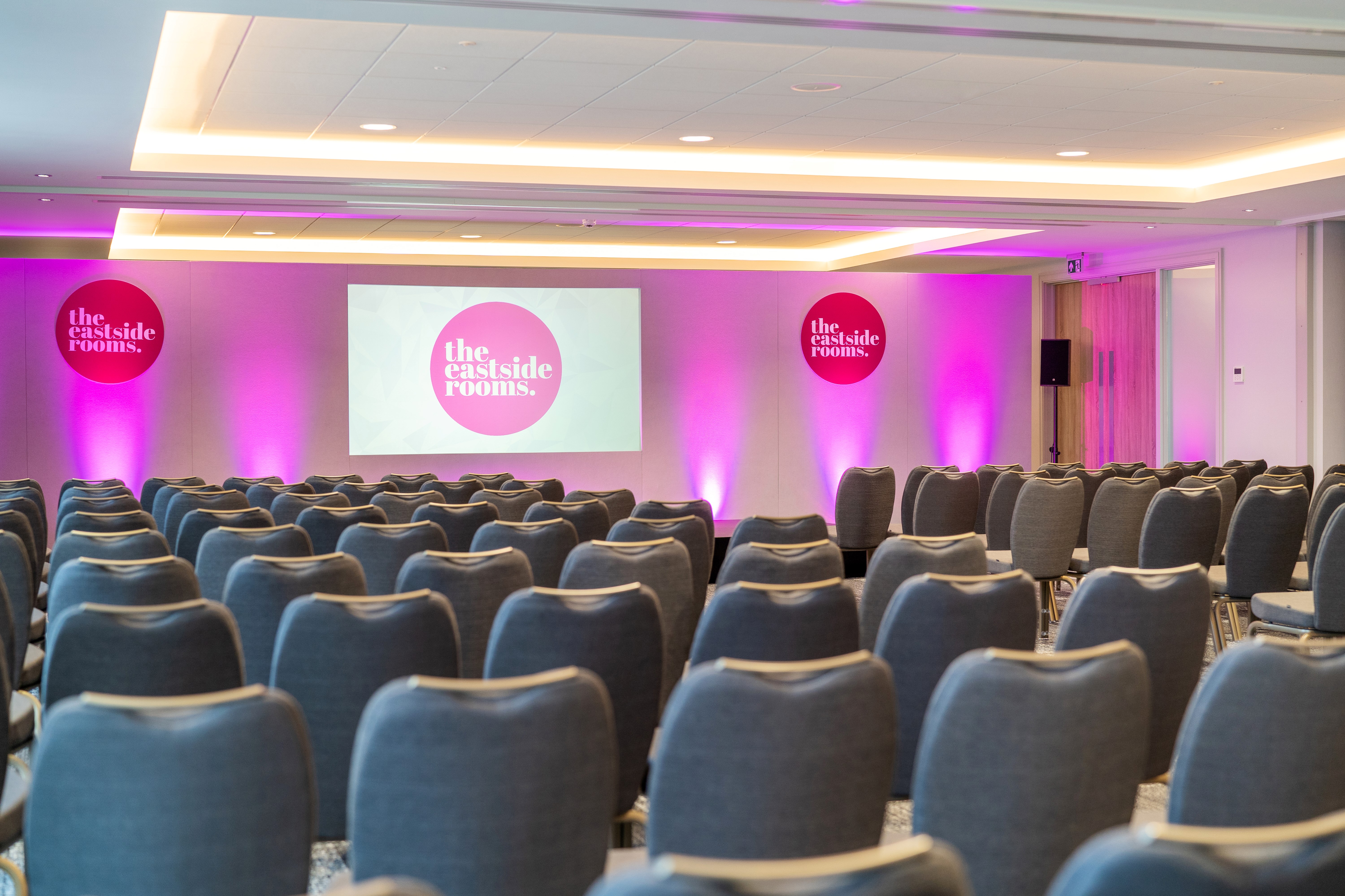 Event space at Ashtead One with arranged chairs for conferences and presentations.