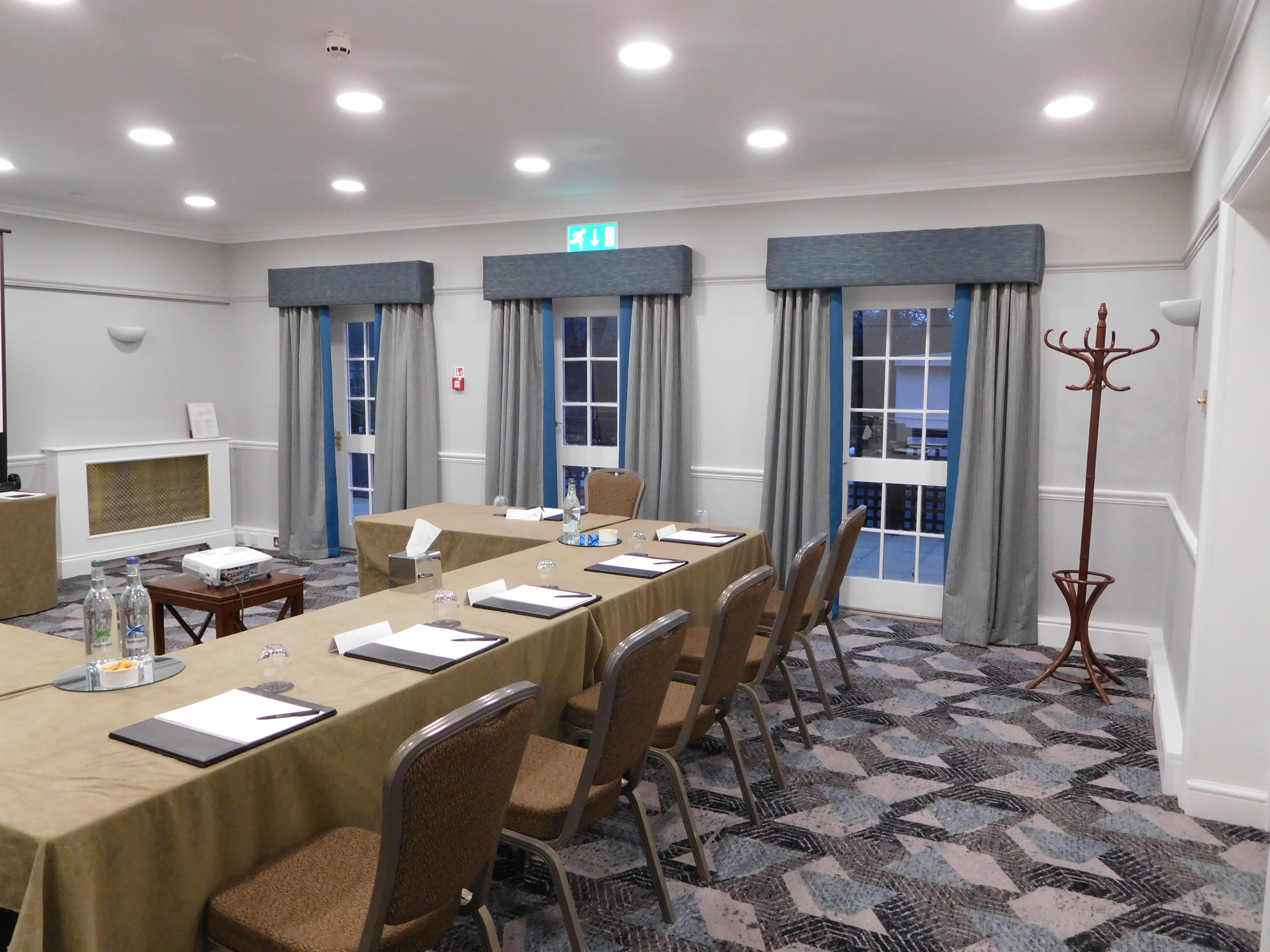 Ash Suite meeting room at Brandshatch Place, bright and organized for professional events.