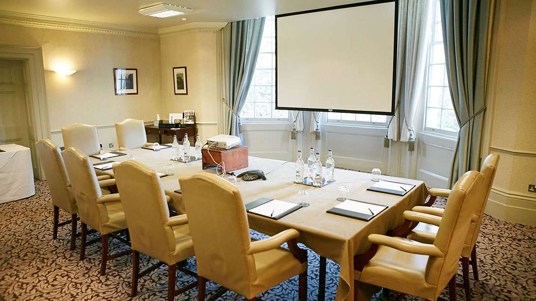 Boardroom at Brandshatch Place Hotel, elegant meeting space for corporate events.