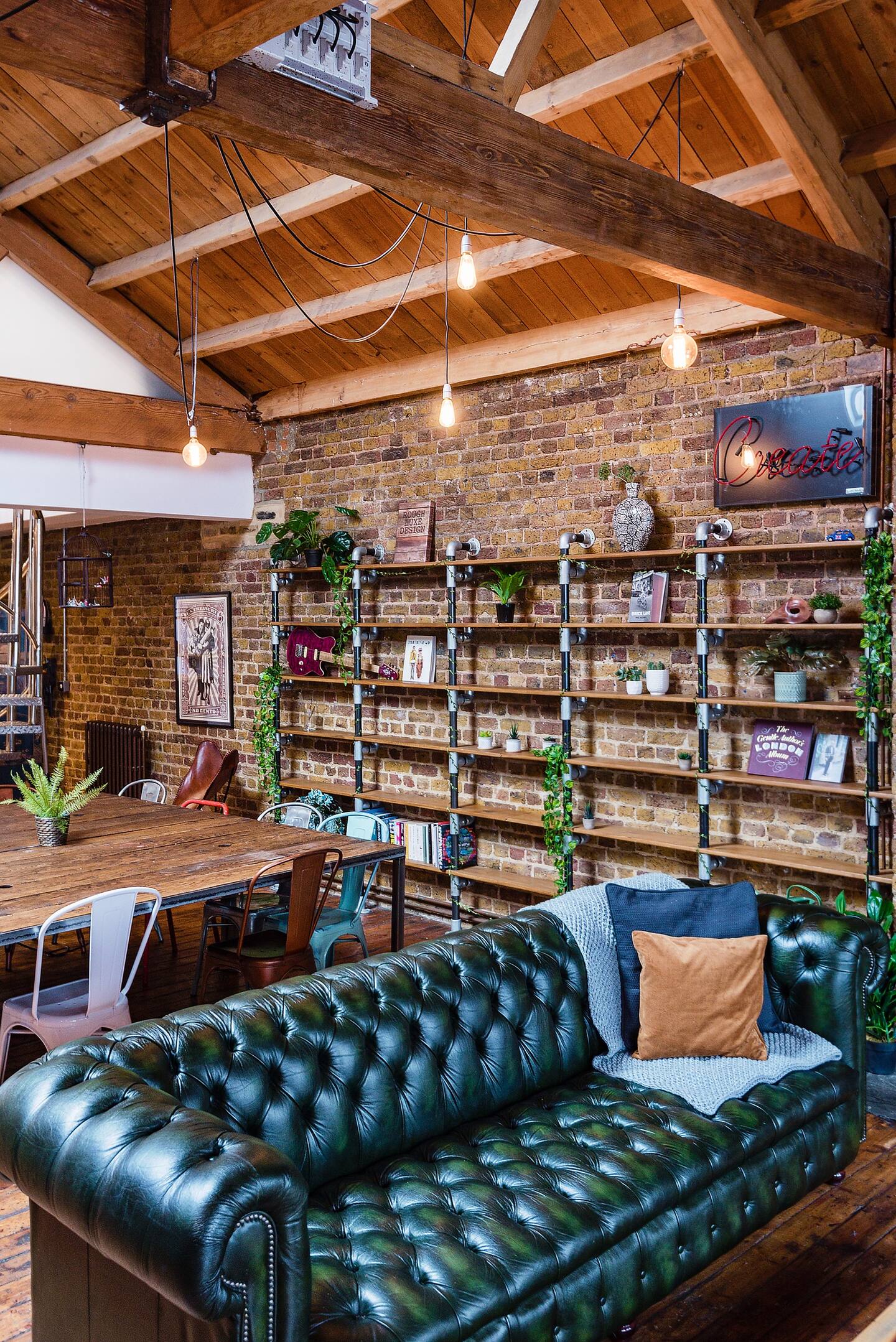 Stylish Shoreditch loft meeting space with exposed brick and roof terrace views.
