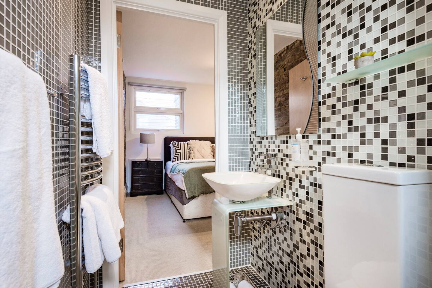 Modern bathroom with mosaic tiles in The Loft - Shoreditch event venue.