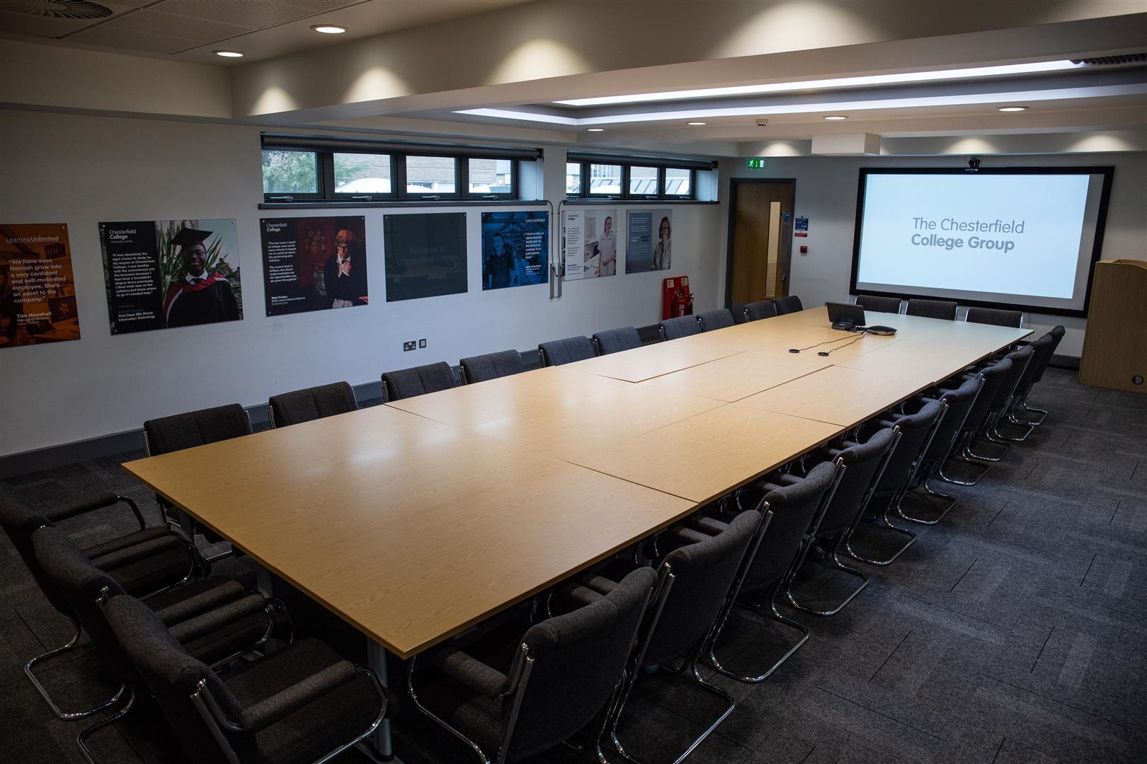 Boardroom at Chesterfield College with modern AV setup for meetings and events.