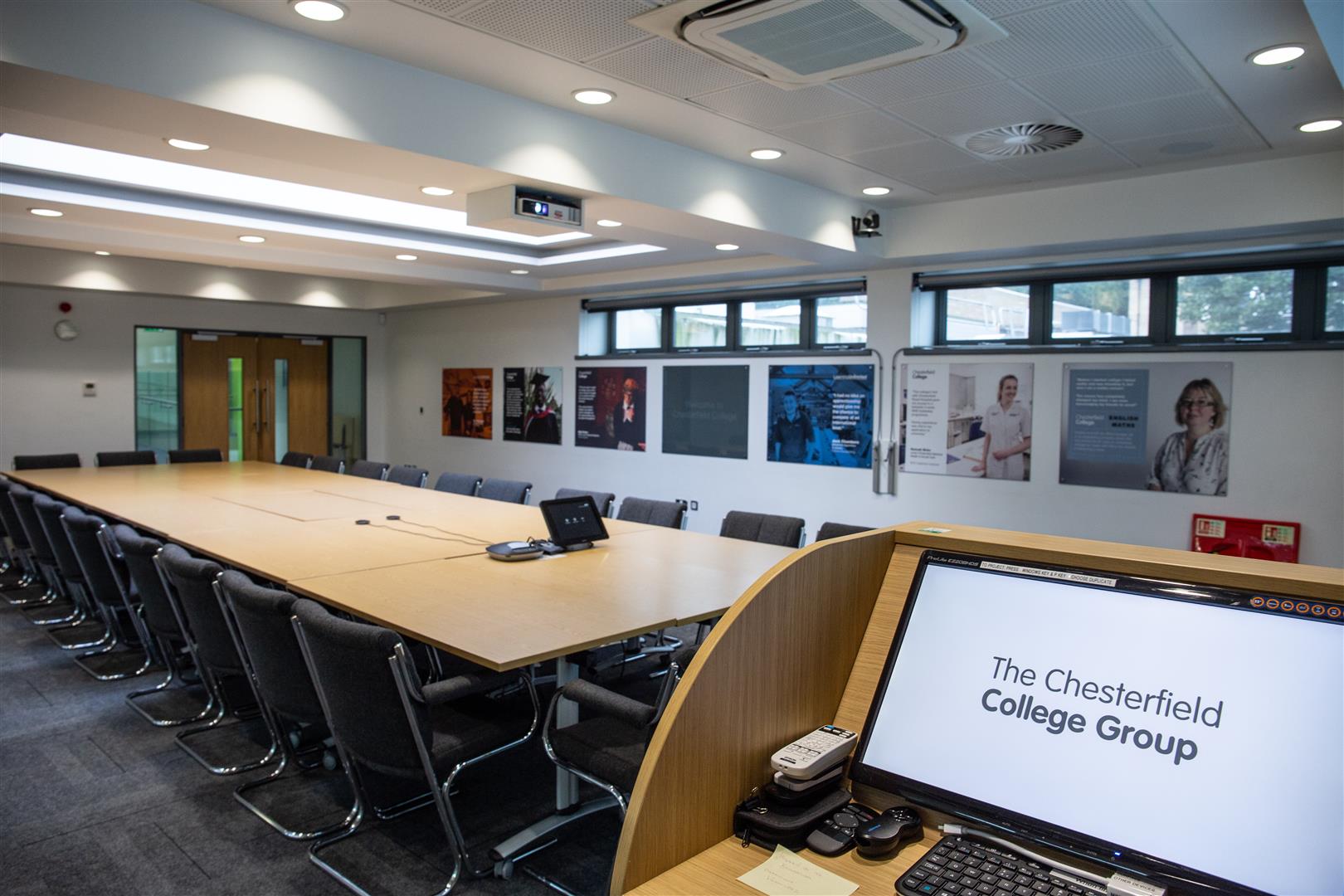 Modern conference room at Chesterfield College with ergonomic chairs for corporate events.