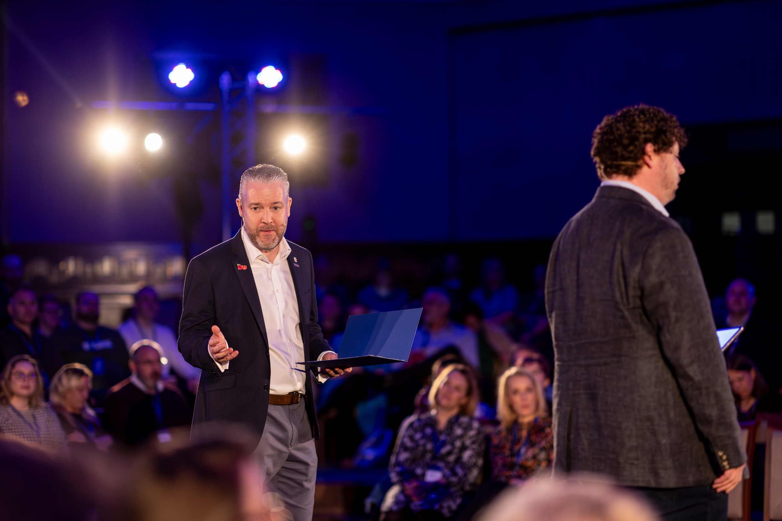 Beveridge Hall event with speaker engaging audience in University of London venue.