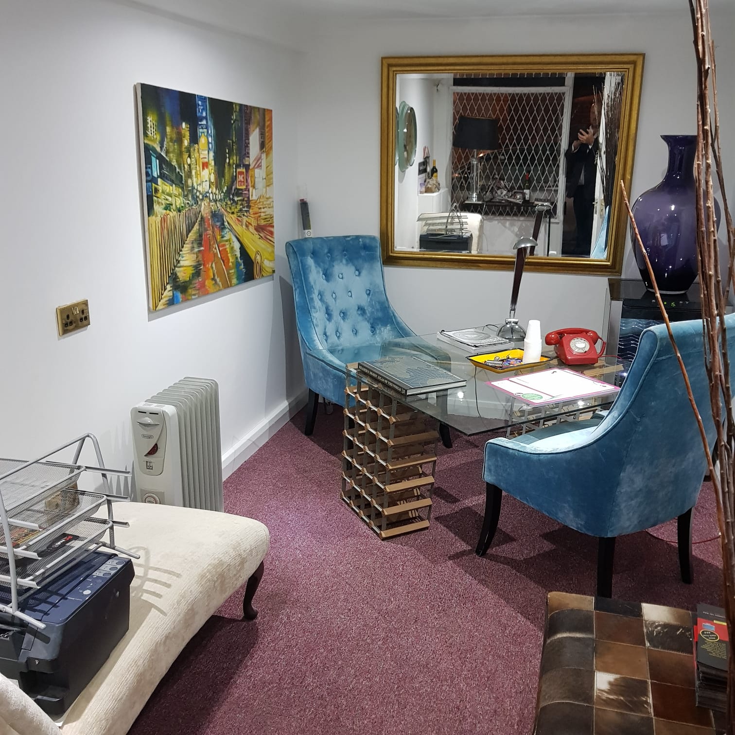 Modern meeting space with blue chairs, ideal for brainstorming and gatherings.