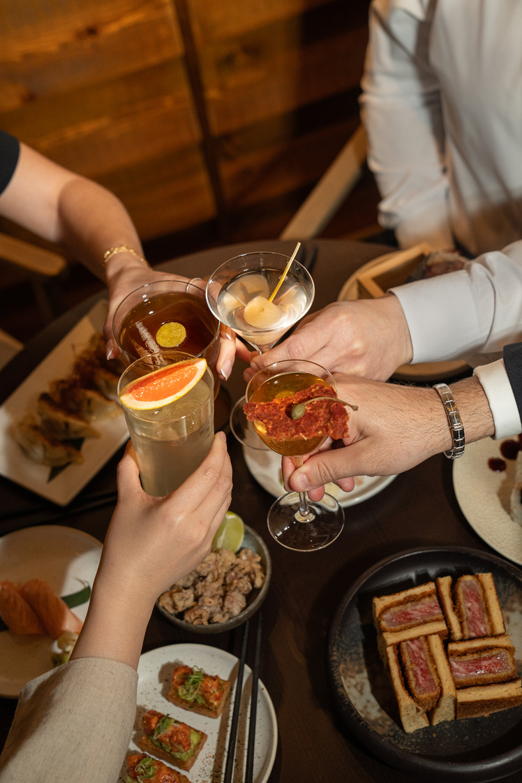 Vibrant toast at The Malt Lounge & Bar, ideal for networking events and celebrations.