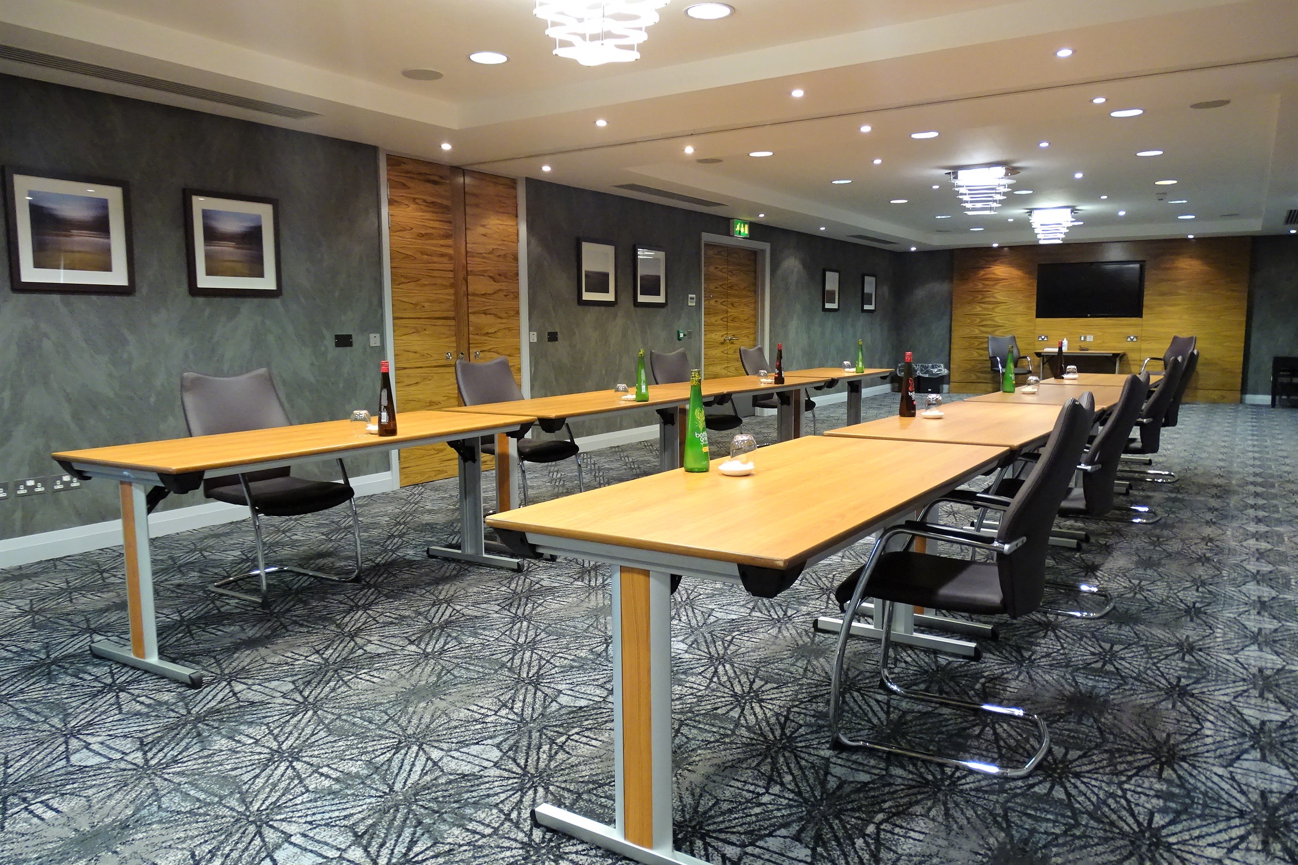 Meeting room at Rookery Hall Hotel, featuring ergonomic chairs for corporate events.