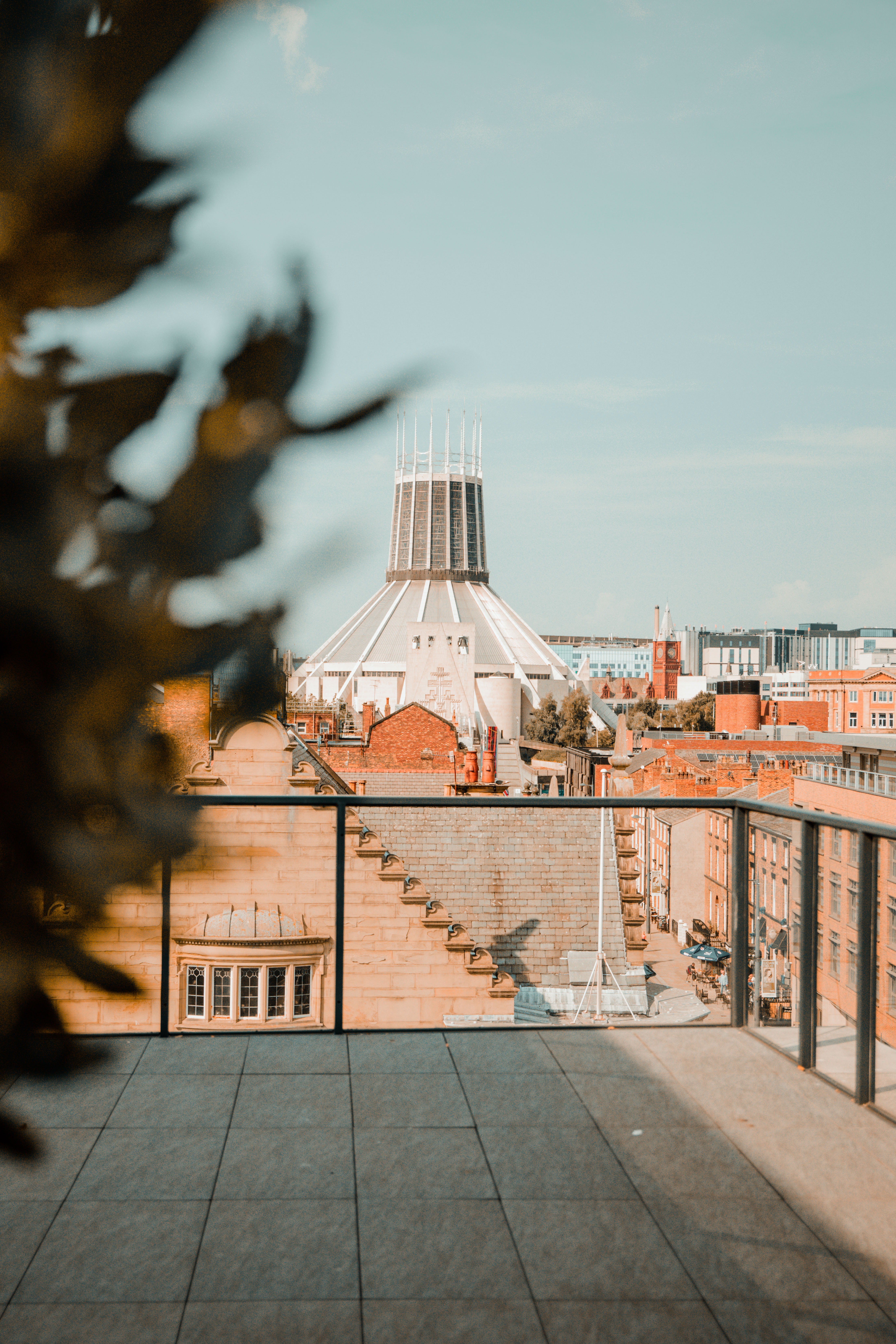 "Fifth Two rooftop at Hope Street Hotel with urban skyline, ideal for events and gatherings."