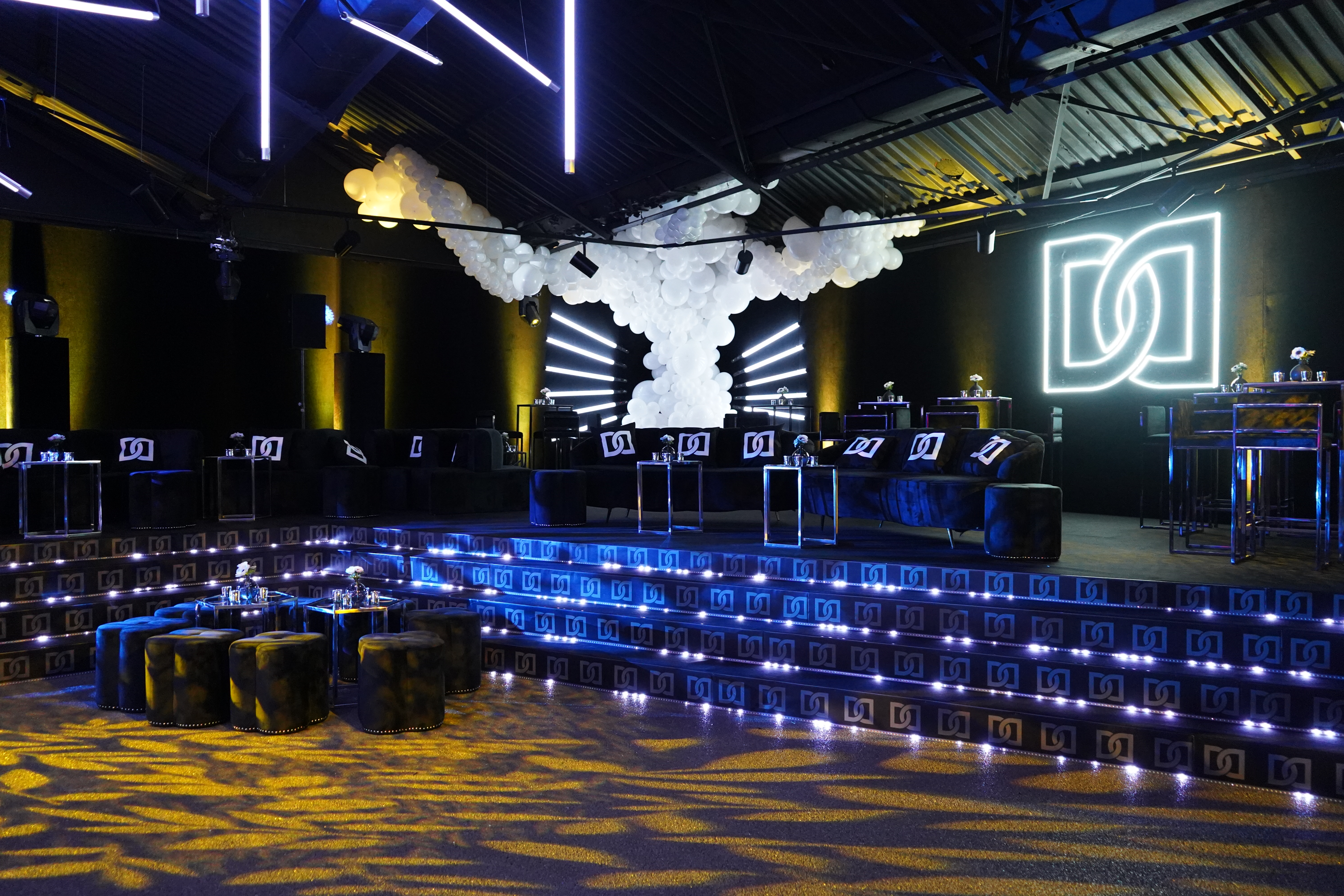 Dynamic event space with tiered seating for meetings and celebrations at The Engine Rooms.