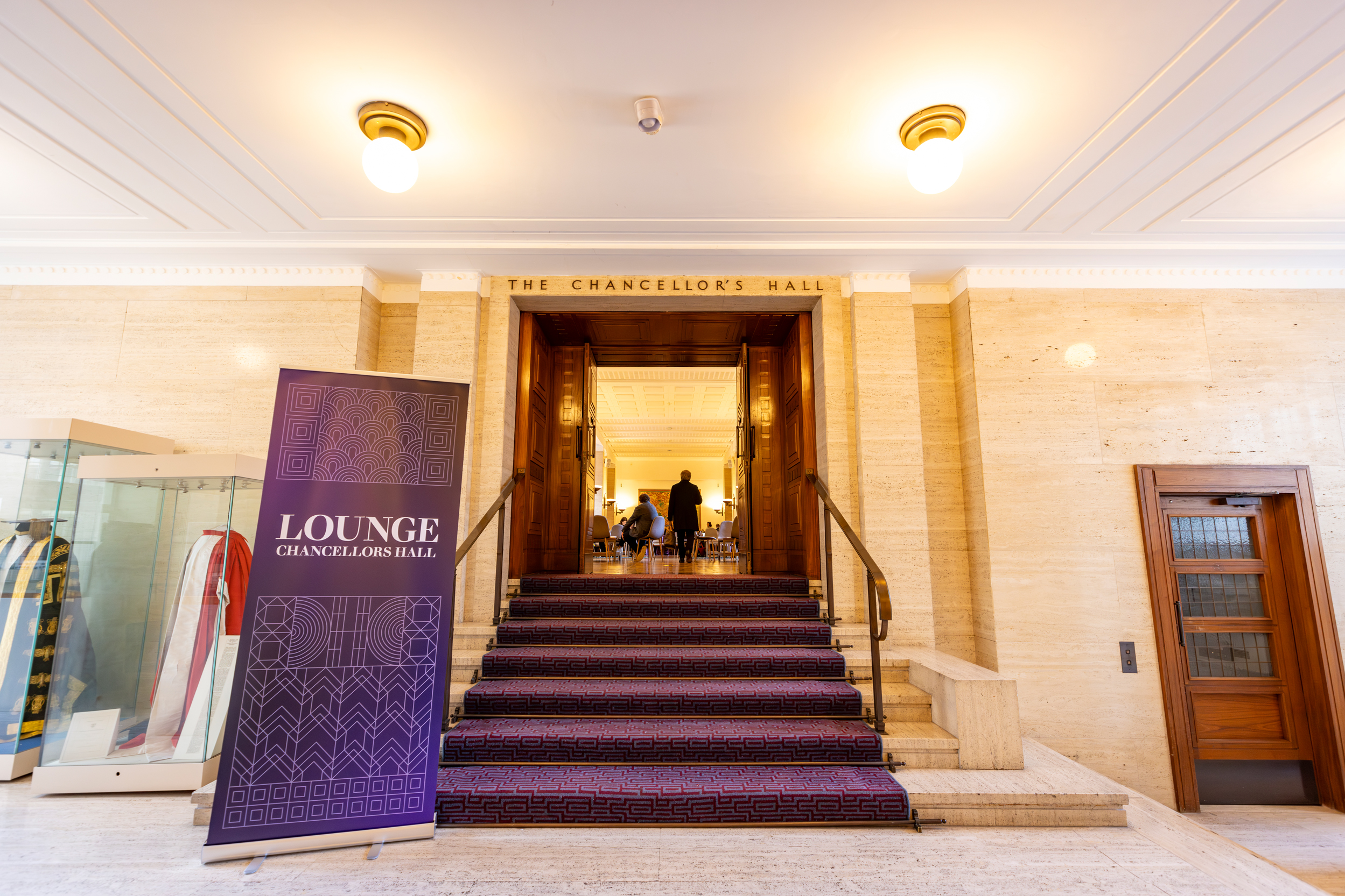 Chancellor's Hall entrance with elegant staircase, ideal for networking events at University of London.