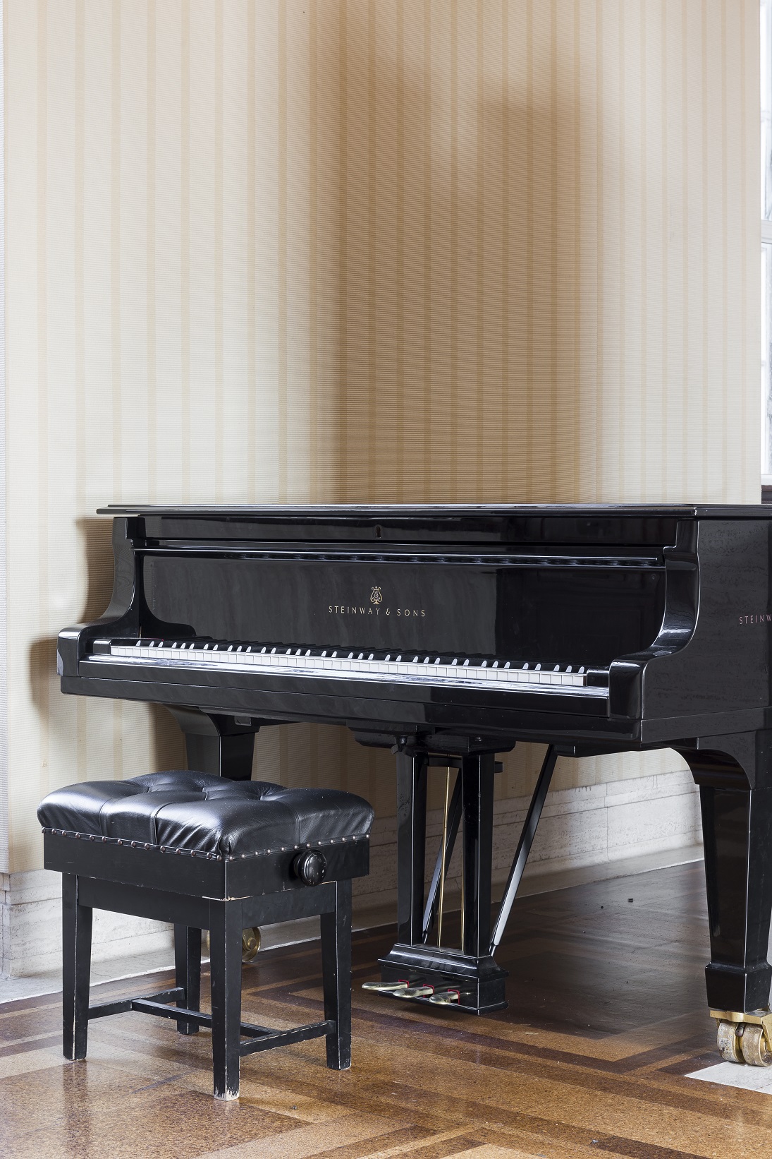 Steinway grand piano in Chancellor's Hall, ideal for weddings and corporate events.