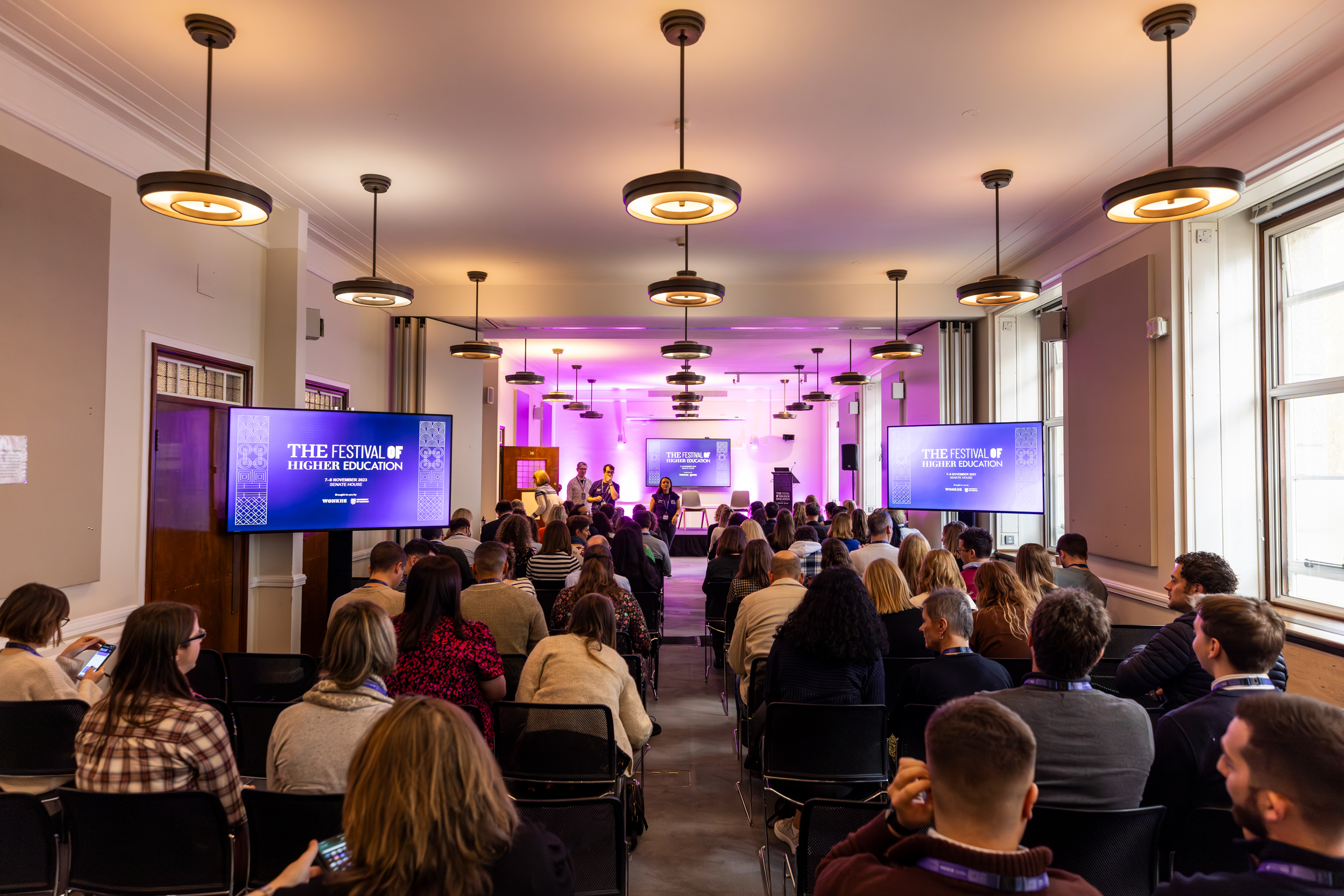 Woburn Suite conference setup at University of London, spacious room with attendees.