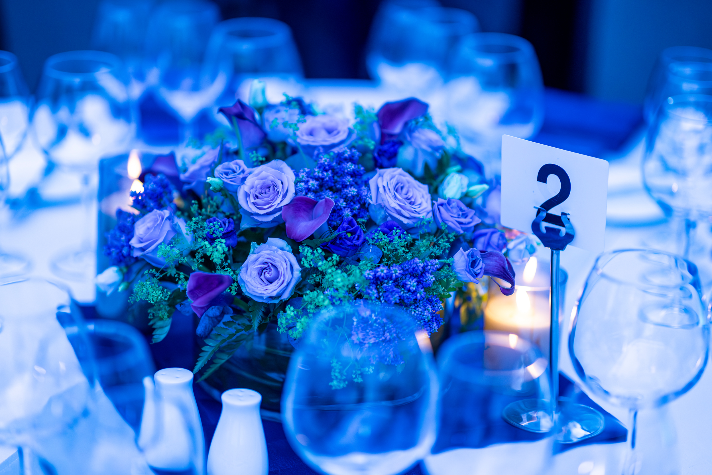Elegant dining table with floral centerpiece at Woburn Suite, University of London venue.