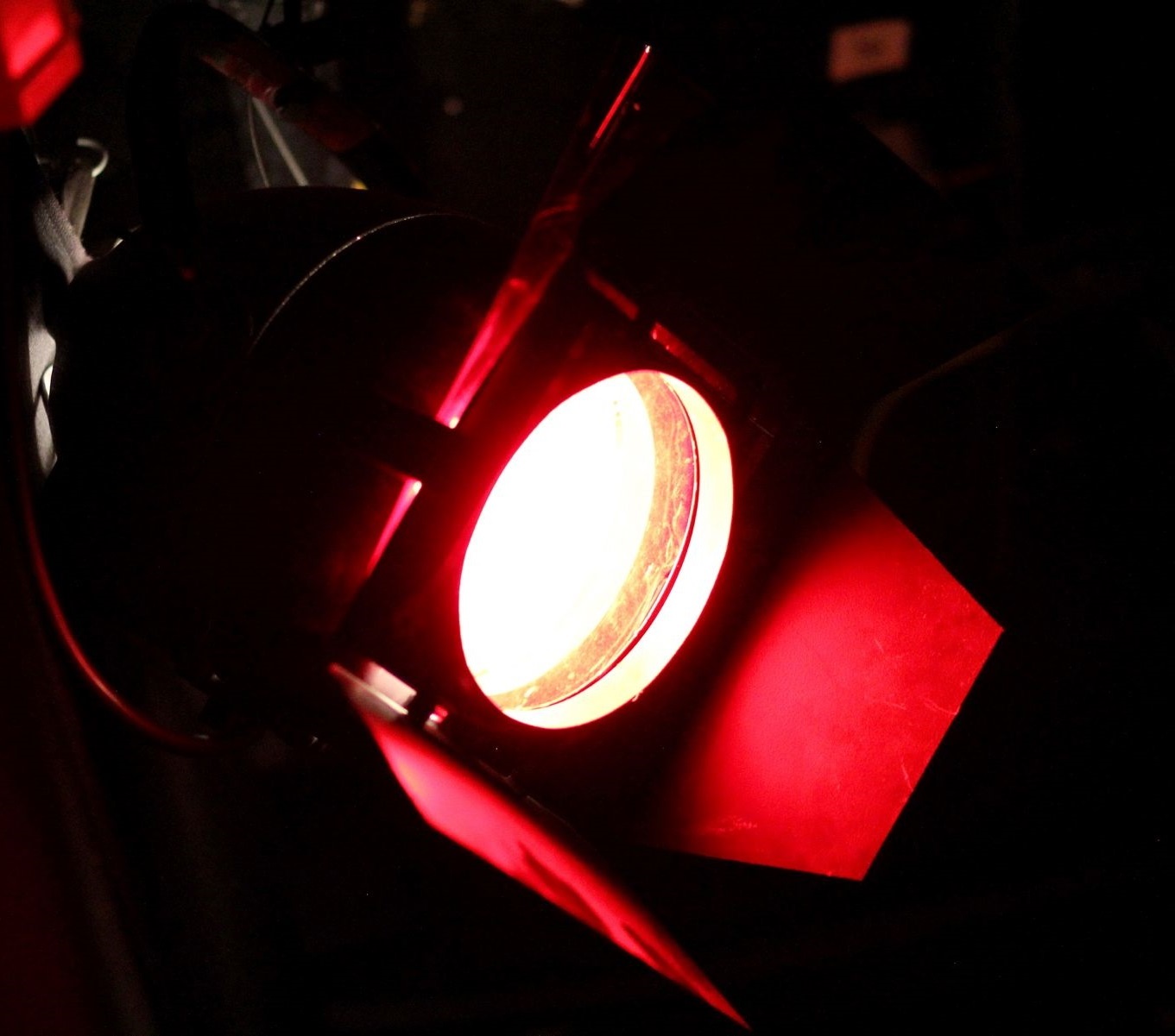 Black Box Theatre stage light in vibrant red for dynamic events and presentations.