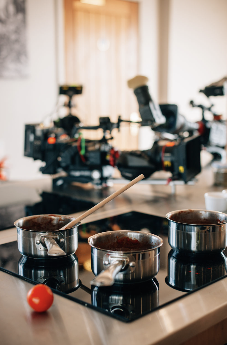 Cookery school kitchen with cameras for interactive culinary events and workshops.