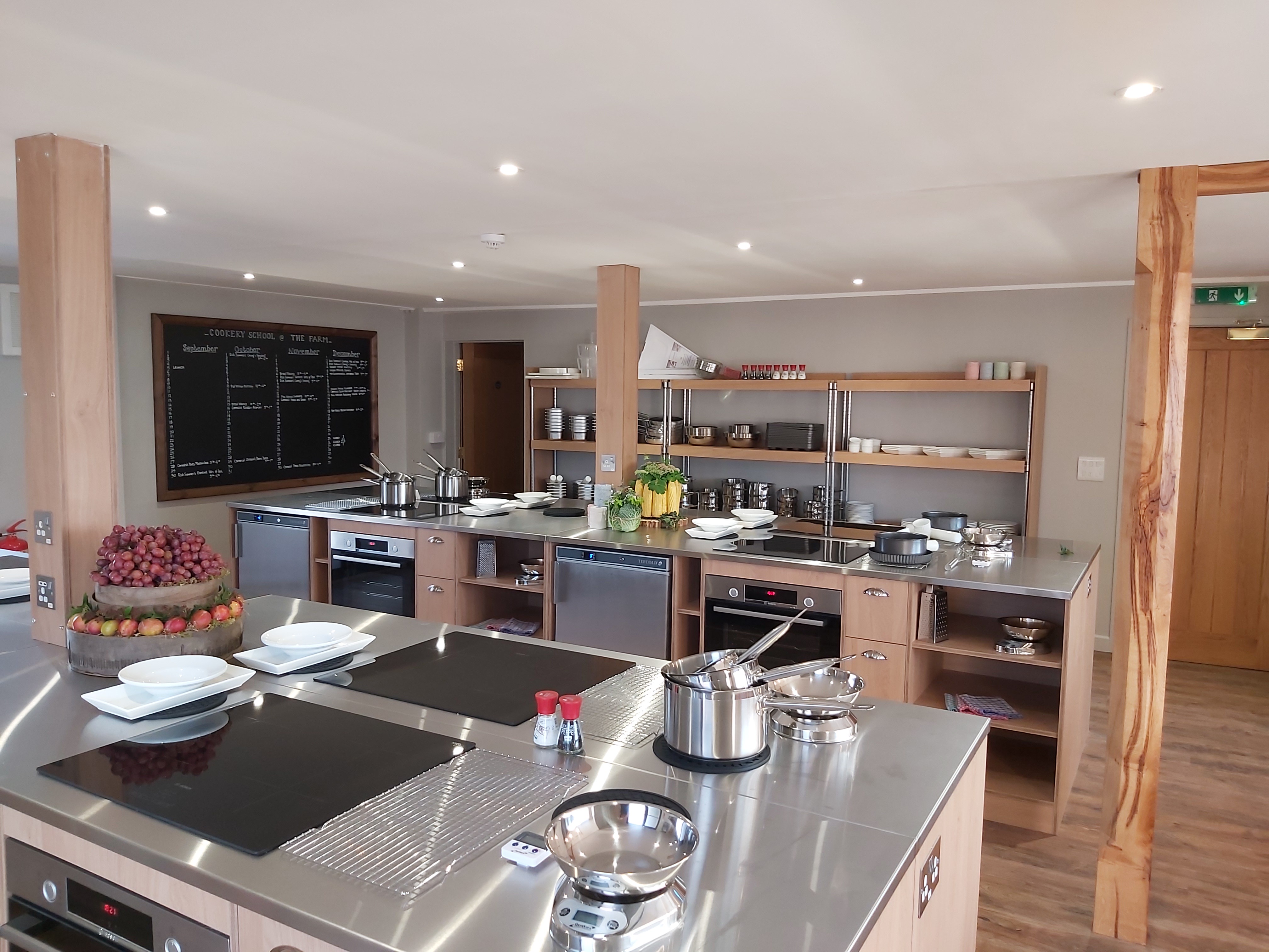 Modern kitchen at The Farm Stratford Cookery School for culinary workshops and classes.