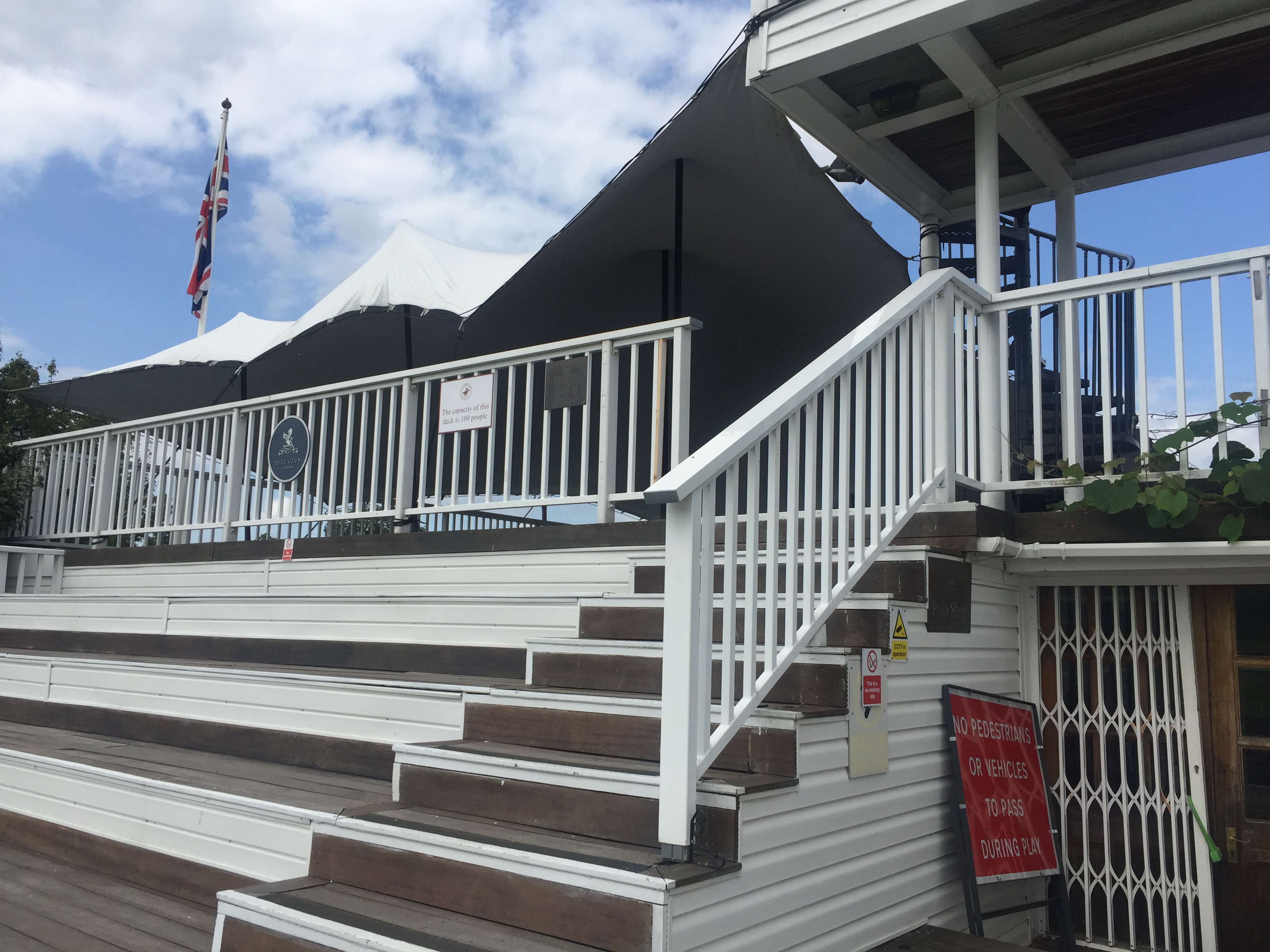 Rooftop Terrace at Ham Polo Club: tiered seating for versatile outdoor events.