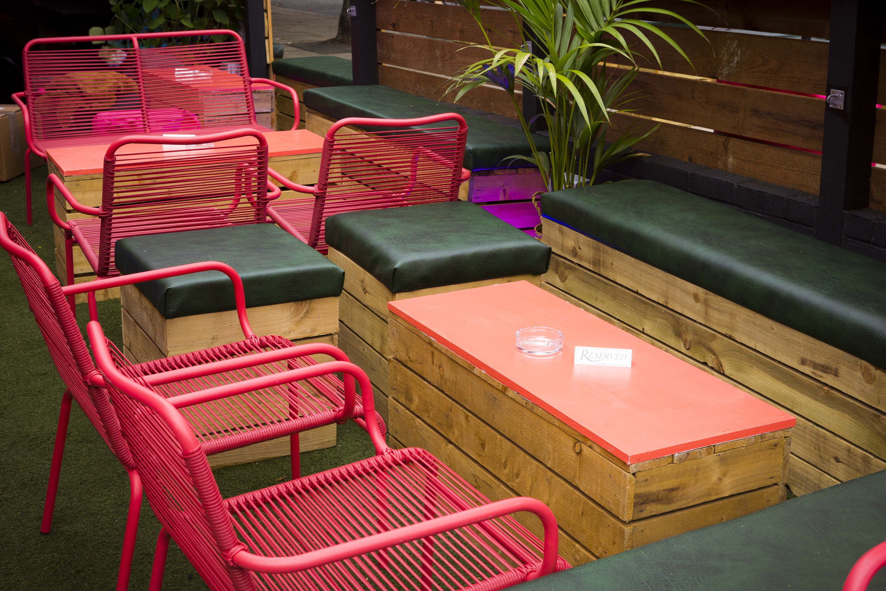 Vibrant lounge area at Biddy Mulligan's Olympia for casual meetings and networking events.