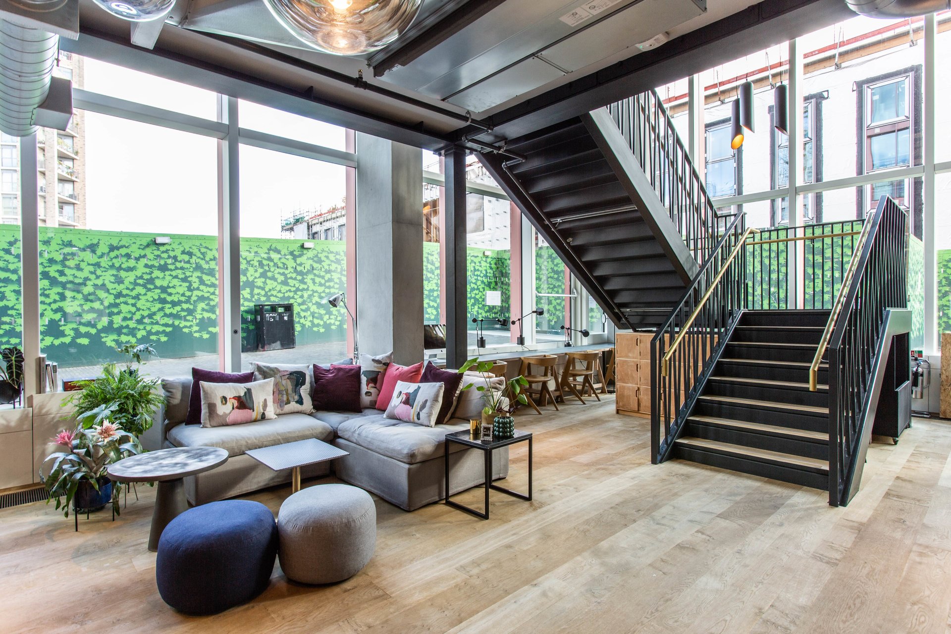 Modern lounge event space with natural light, ideal for networking and gatherings.