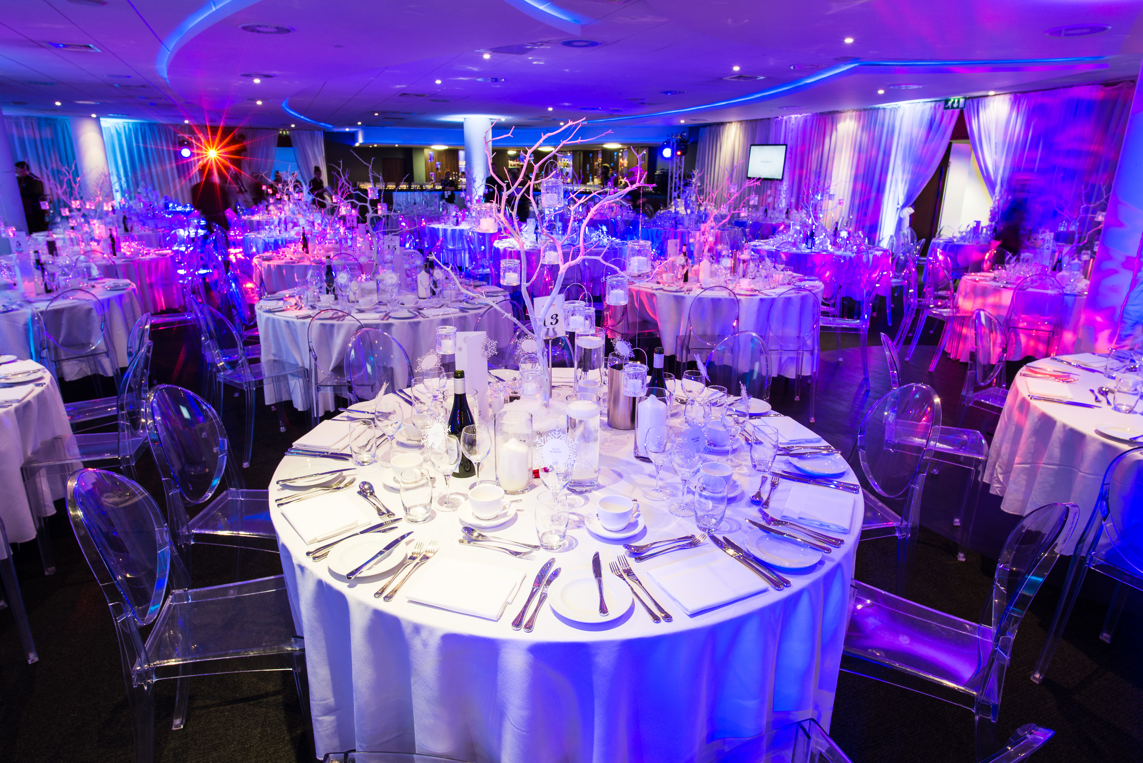 Mike Channon Suite banquet hall with elegant tables, ideal for weddings and corporate events.