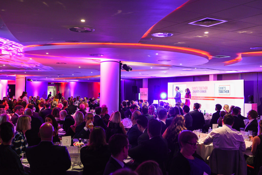 Mike Channon Suite at Southampton FC, elegant gala dinner with engaged attendees.