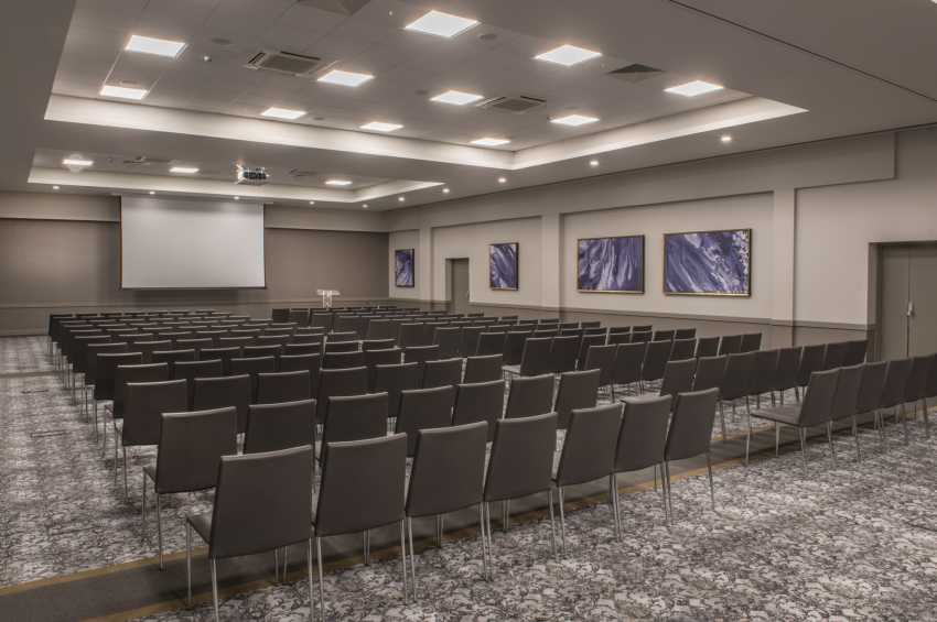 Wokefield Suite meeting space with rows of chairs for corporate events and presentations.